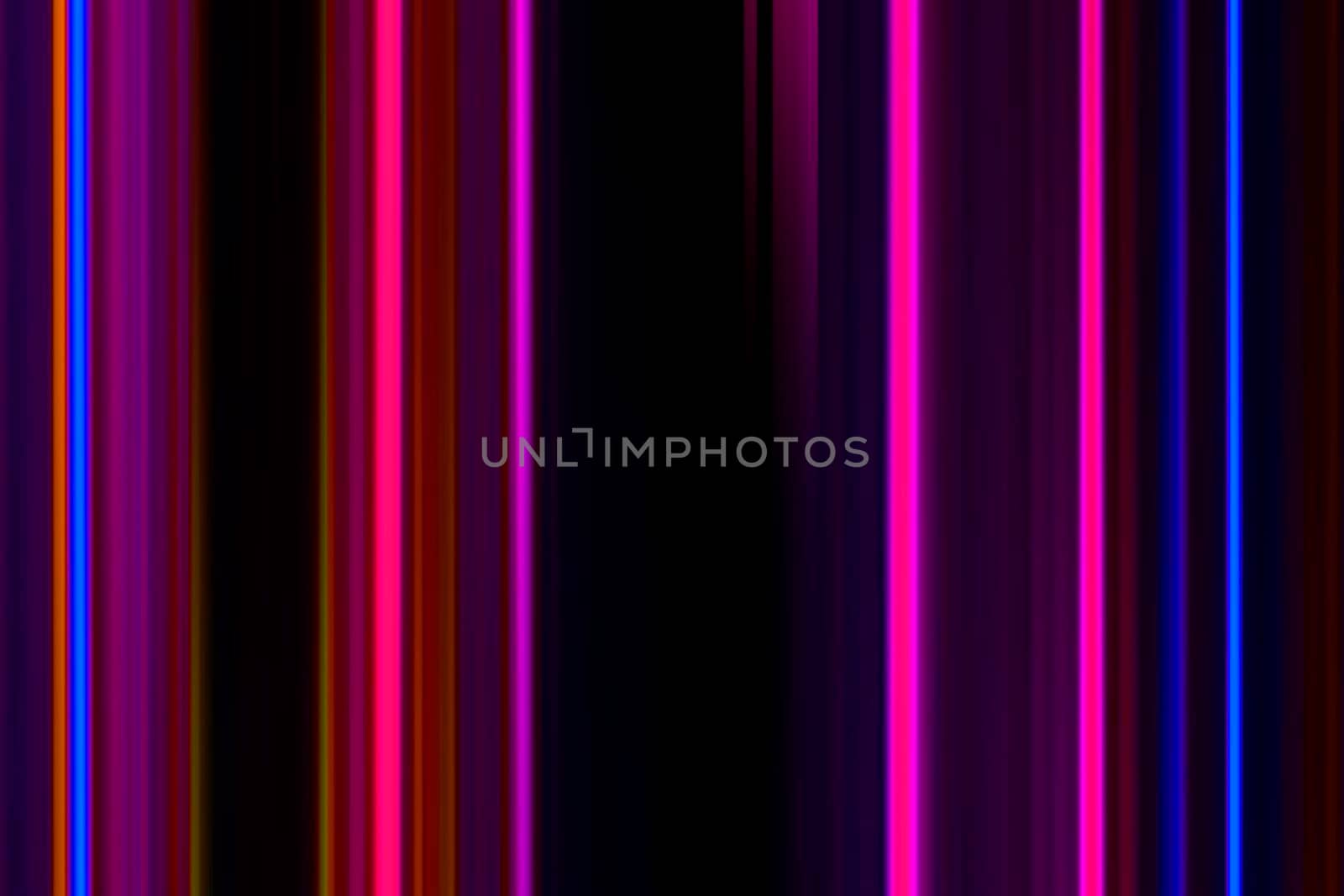 Abstract night background, blurred bokeh light. Multi colored neon lights on dark city street, reflection of neon light. Night view