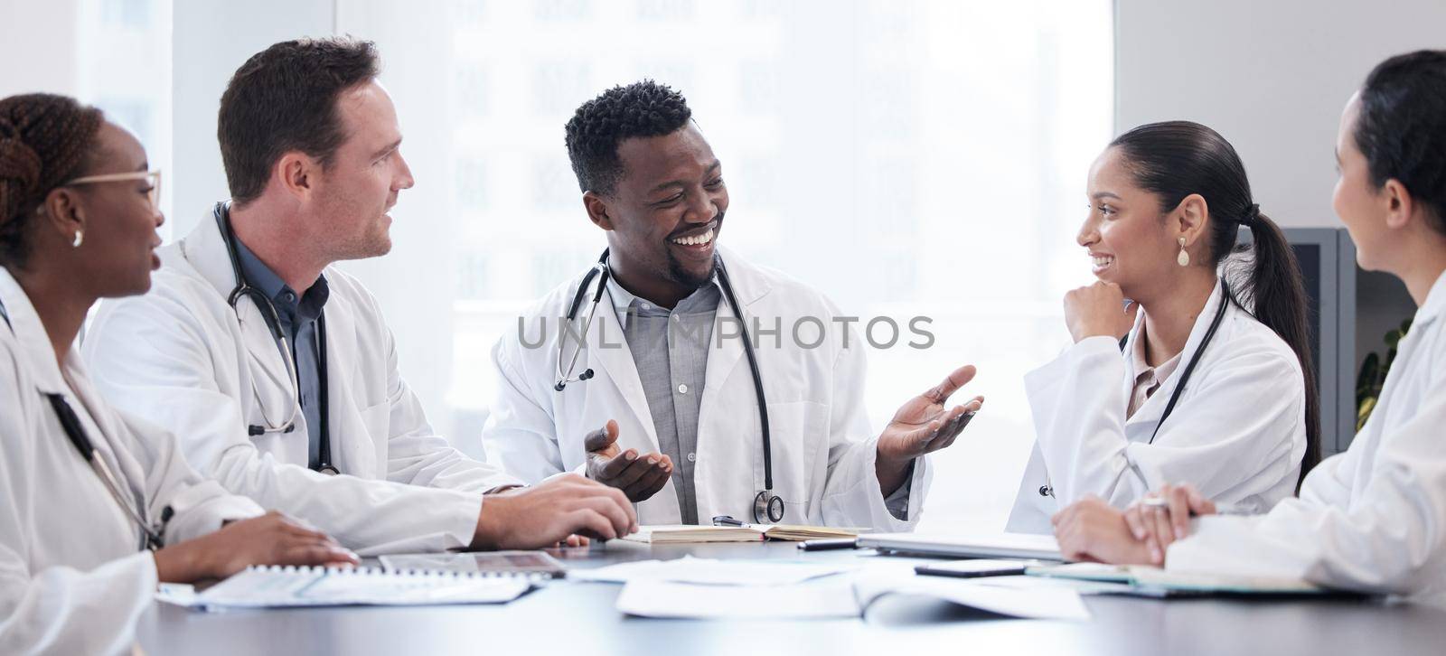 a group of doctors having a staff meeting.