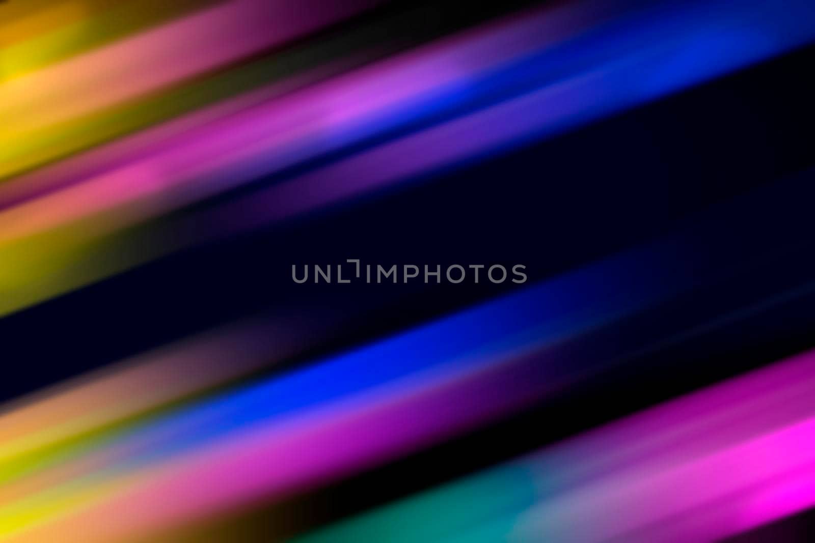 Abstract night background, blurred bokeh light. Multi colored neon lights on dark city street, reflection of neon light. Night view