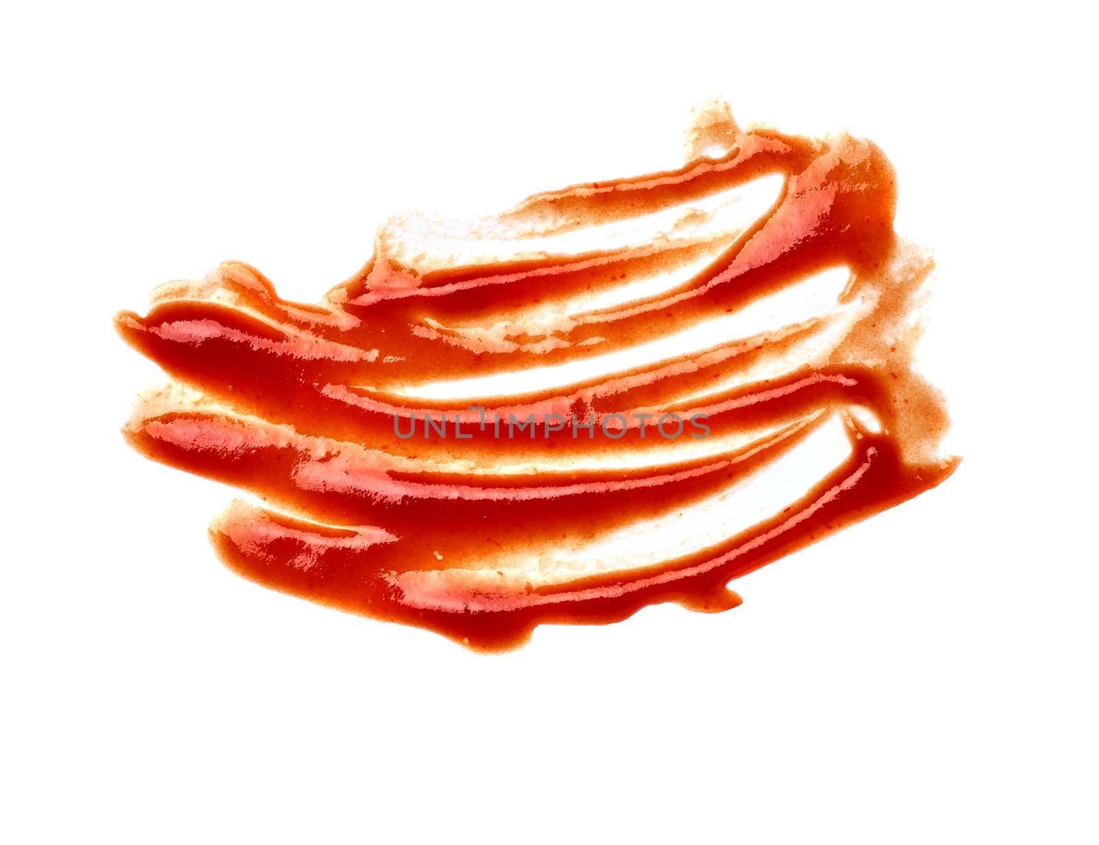 close up of a ketchup stain on white background