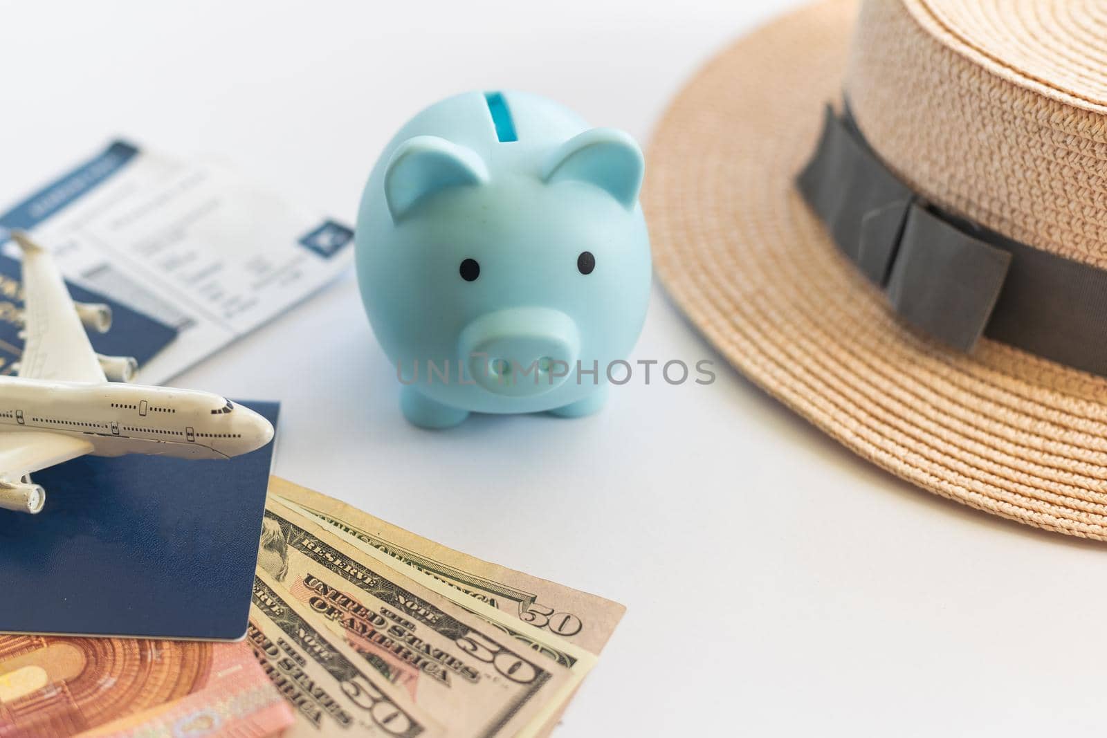 Travel or vacation money saving concept, piggy bank.