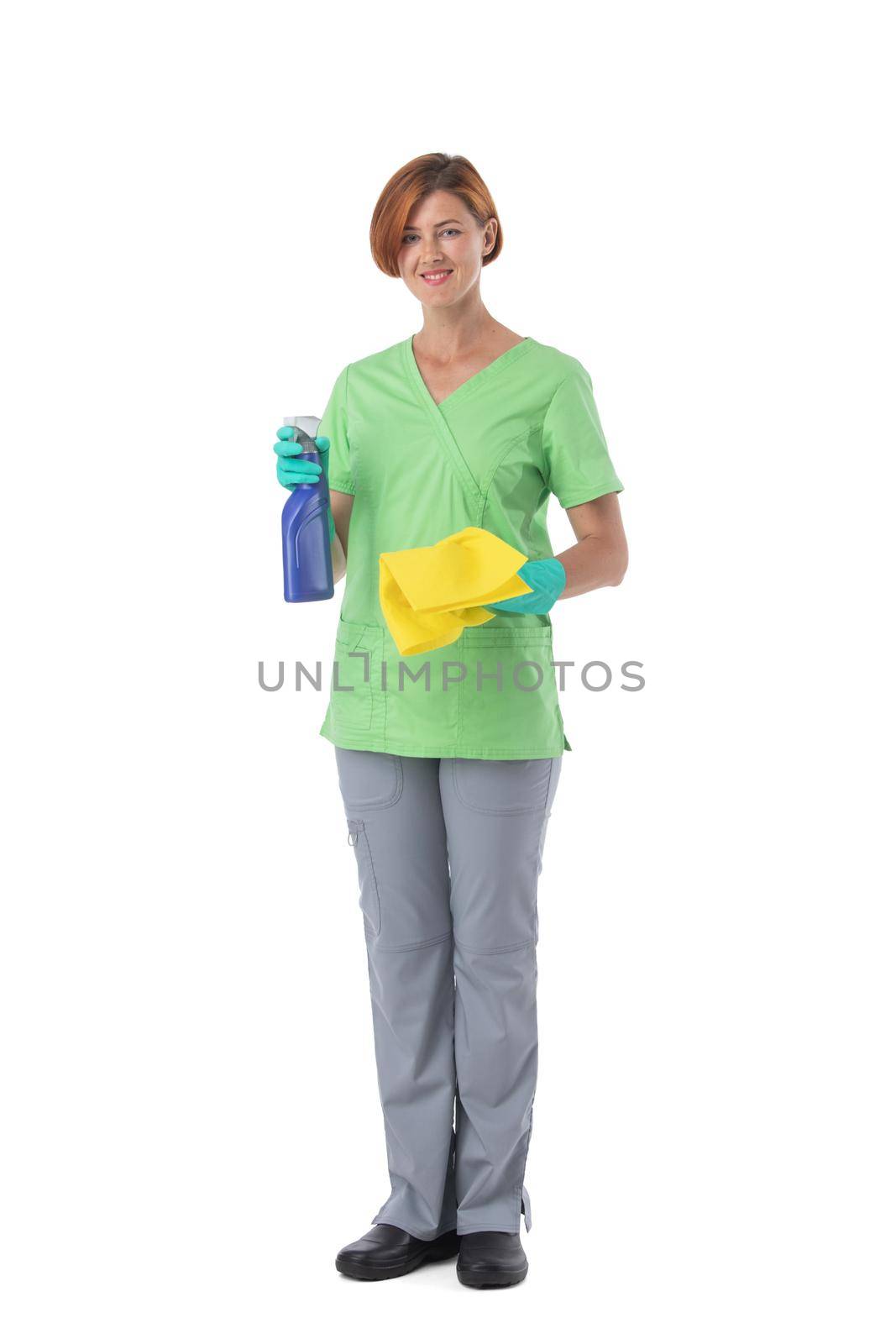 Full length portrait of professional cleaner woman with cleaning spray and rag isolated on white background
