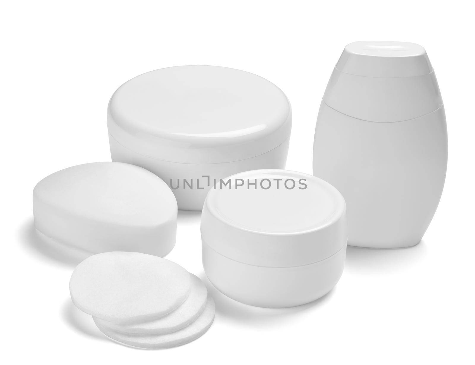 close up of a white beauty cream container and tube on white background