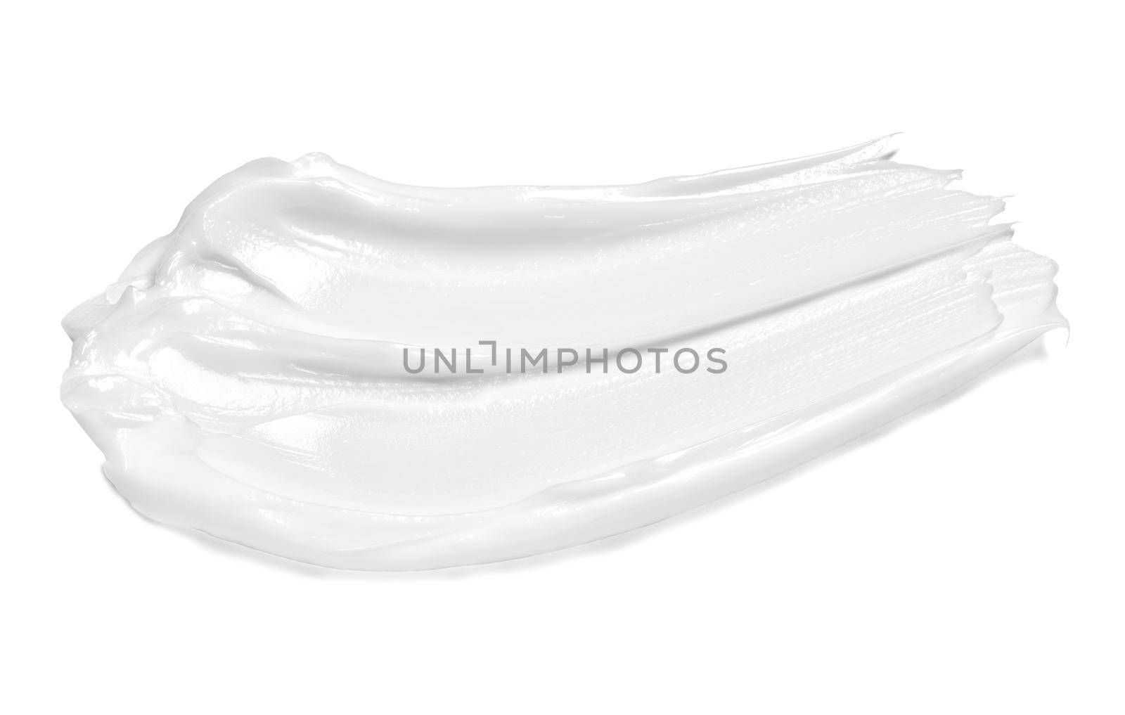 close up of a white cream sample on white background