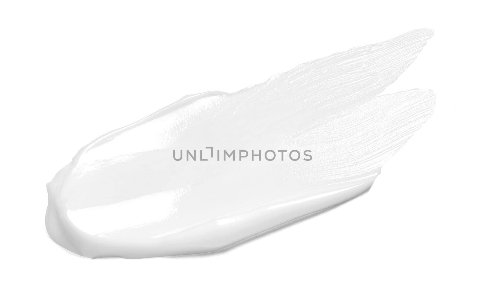 close up of a white cream sample on white background