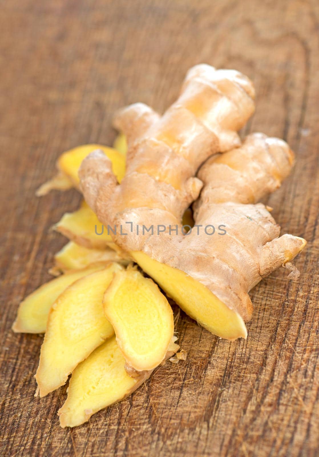 ginger on wooden brown background