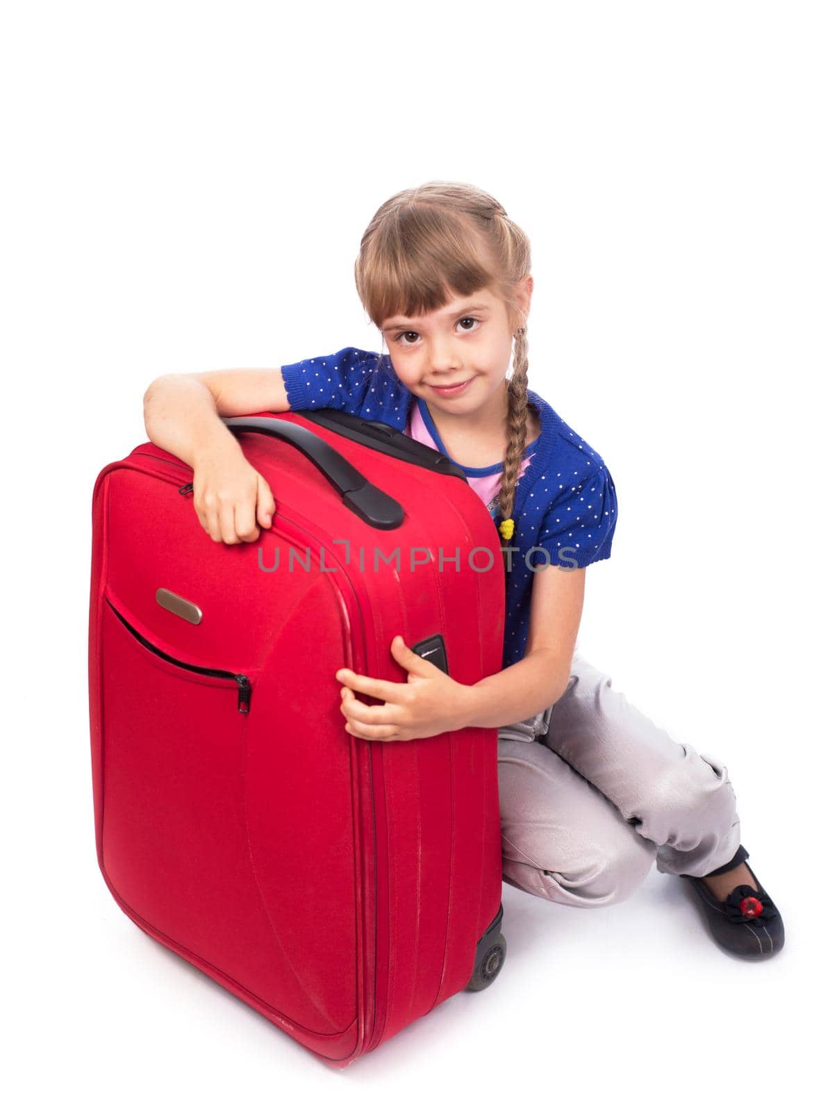 Travel. Journey. Tourism. Cute little girl and big red suitcase isolated on white background by aprilphoto