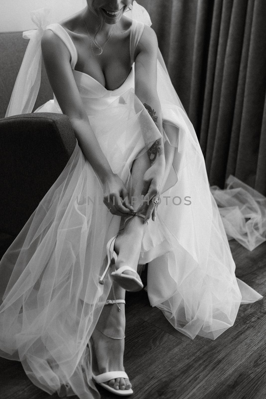 bride in a white dress at the training camp inside the hotel