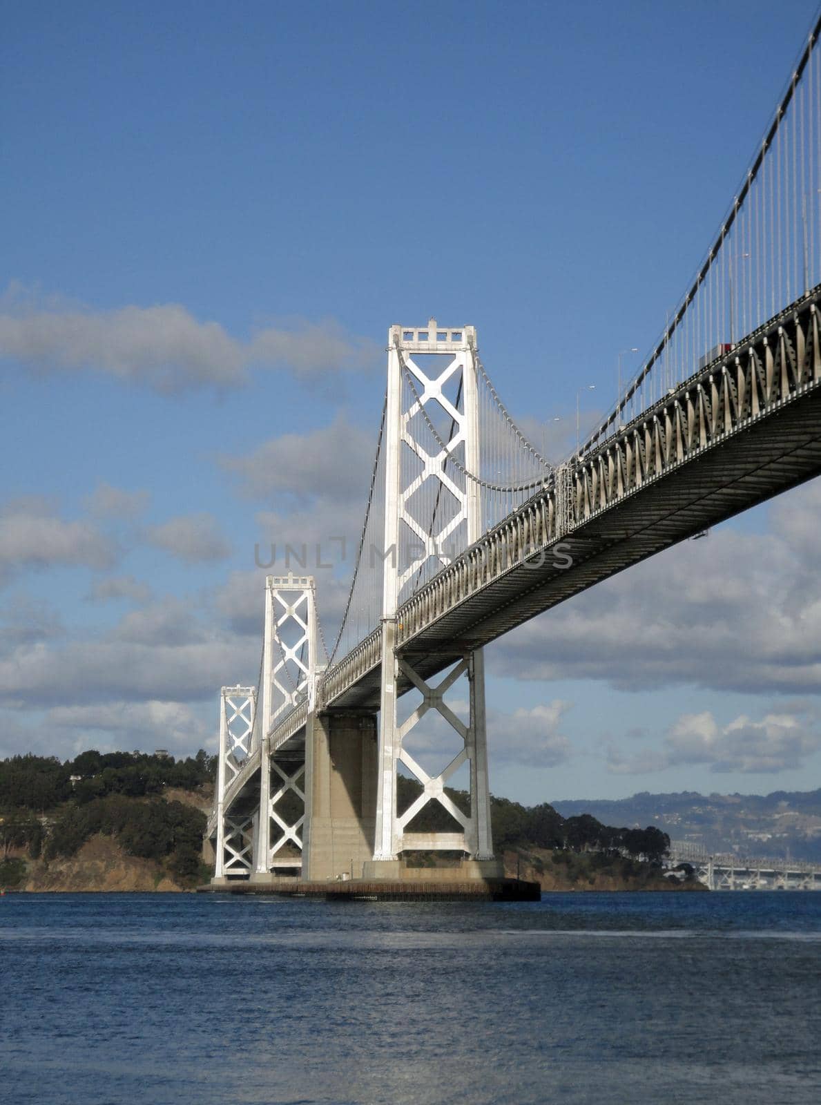 San Francisco Bay Bridge and Bay as Bridge enters into Yerba Buena island.
