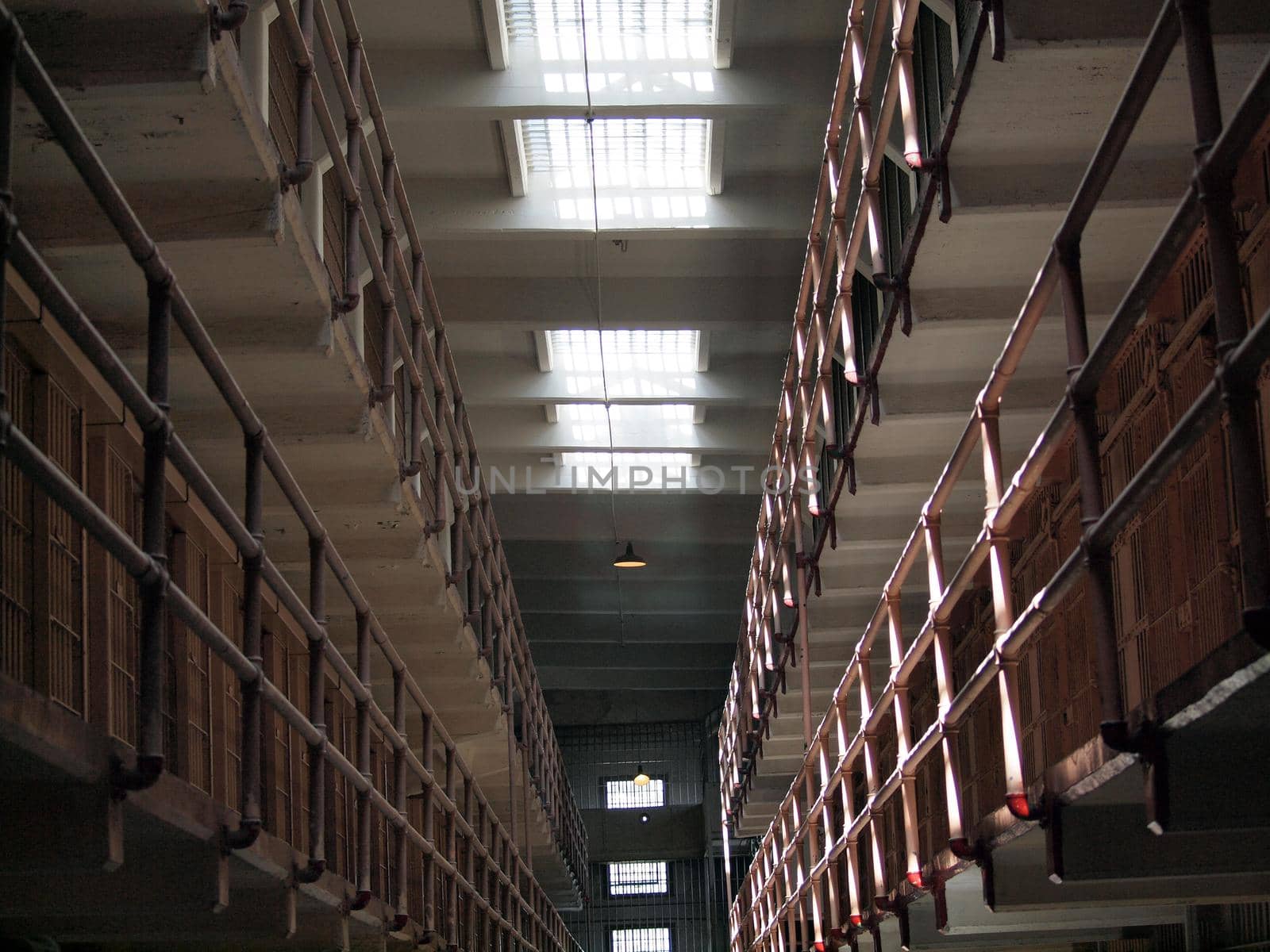 Looking up at Rows of alcatraz jail cells.