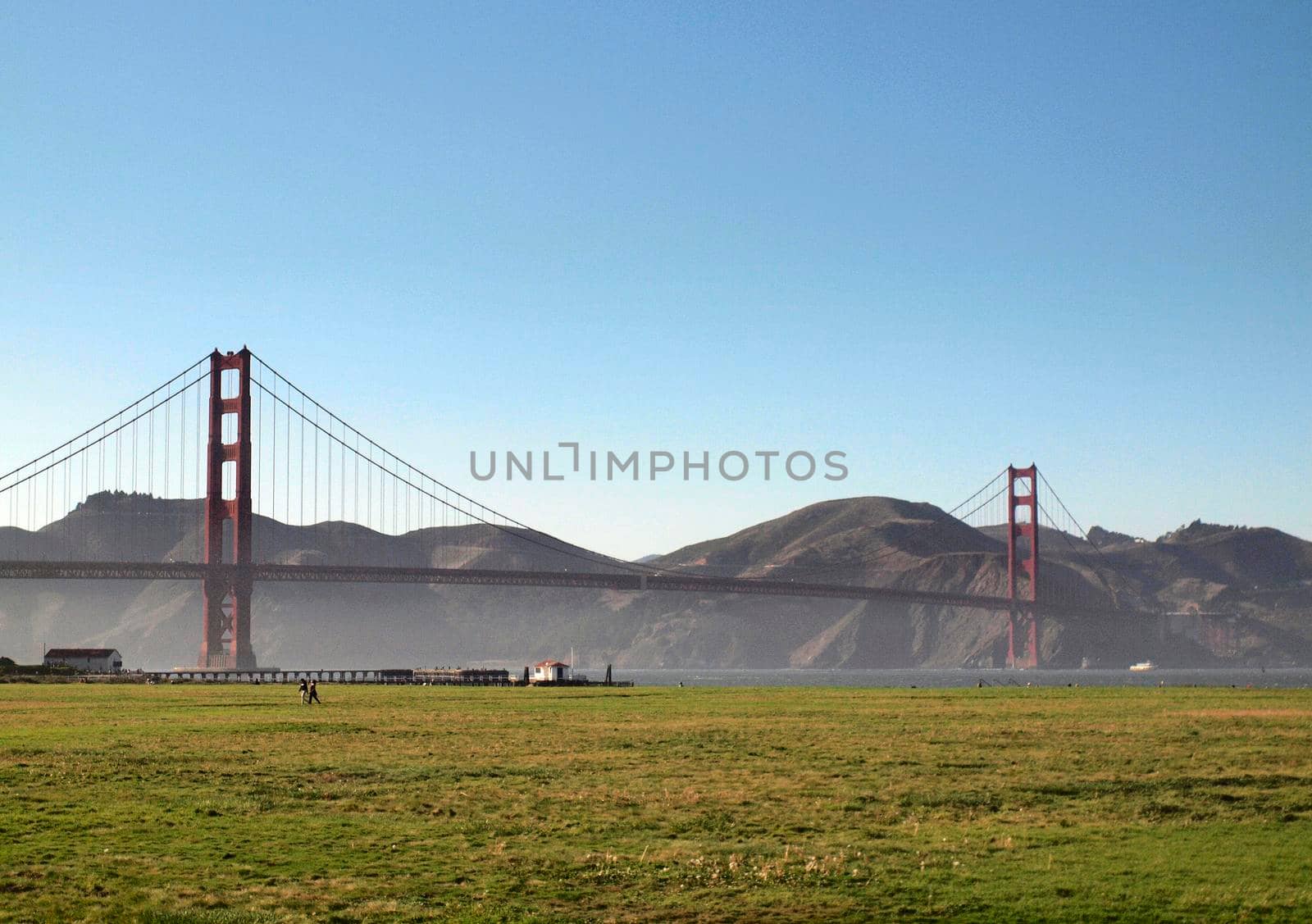 view of golden gate bridge from crissy field with marin county over the bay 