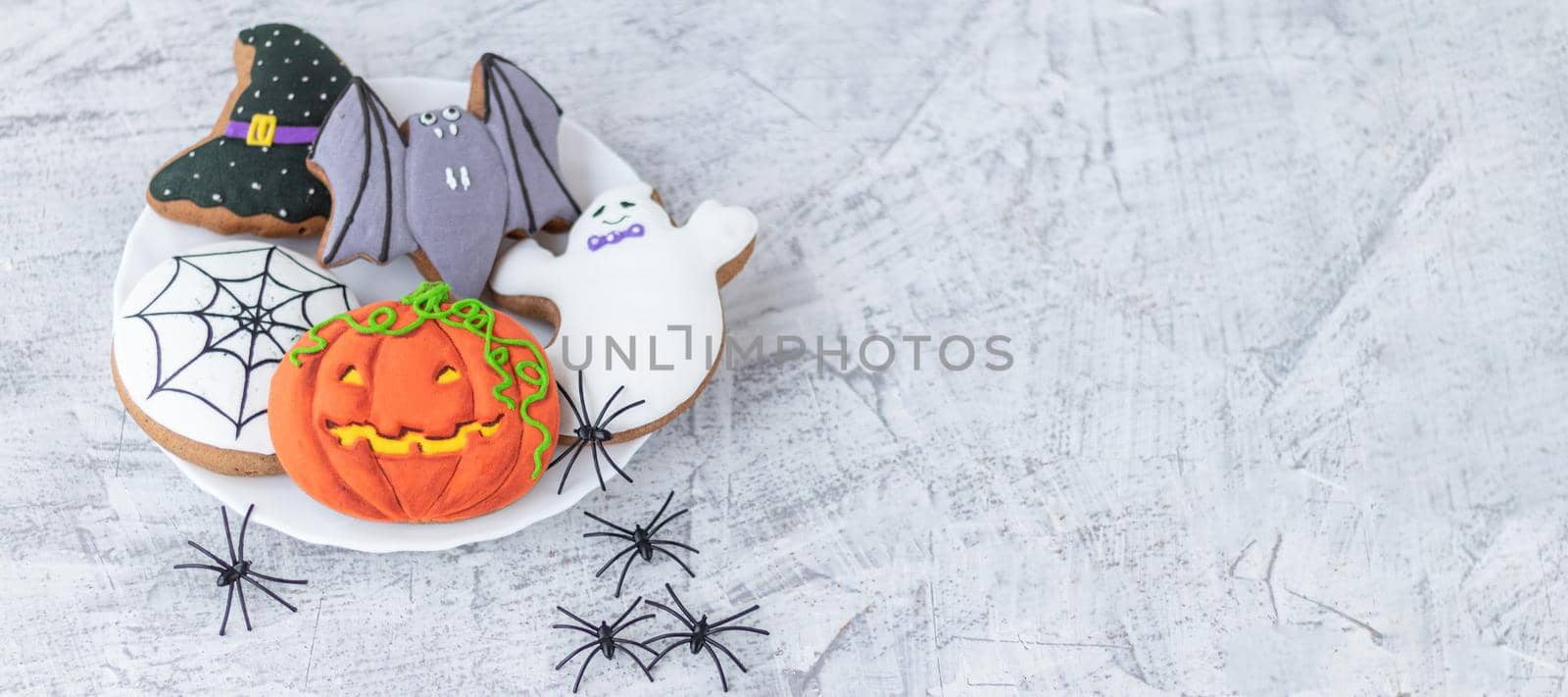 banner with halloween cookies. creepy sweets. gingerbread. sweets in shape of pumpkin, witch's hat, ghost and bat by Leoschka