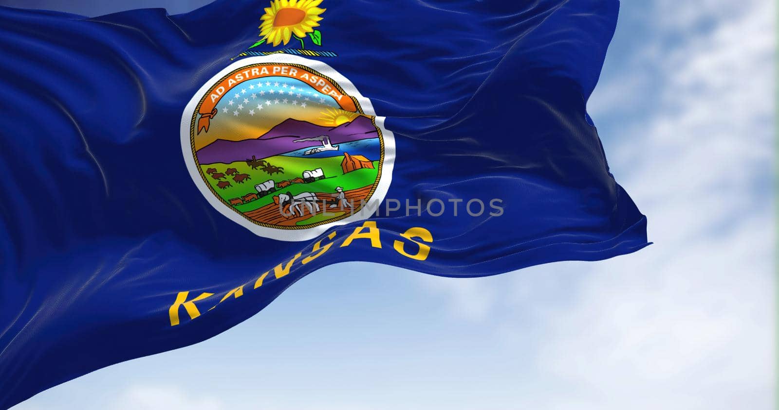 The US state flag of Kansas waving in the wind on a clear day by rarrarorro