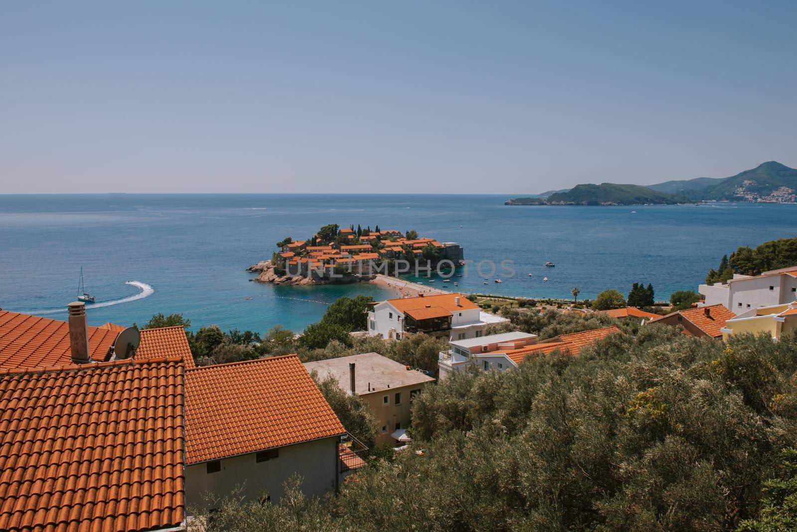 Sveti Stefan is a small island on Adriatic coast of Montenegro near of Budva. Resort is known commercially as Aman Sveti Stefan. Sveti Stefan peninsula on the Adriatic Sea in Budva, Montenegro, Europe by Andrii_Ko