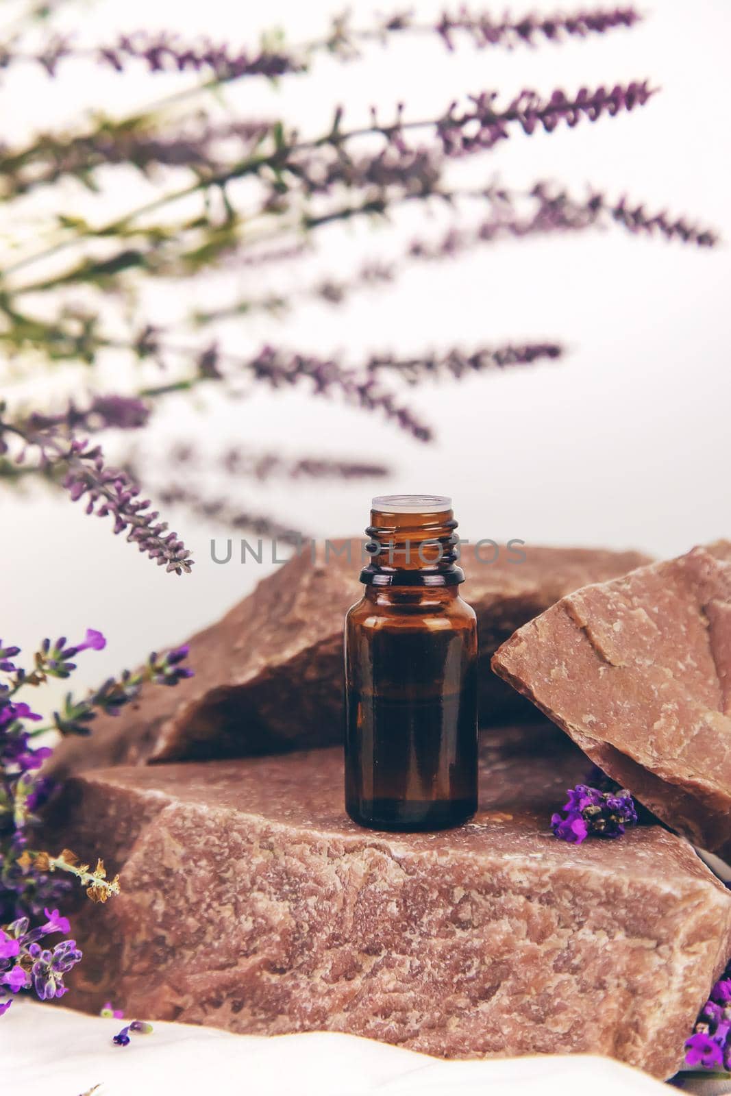Essential oil with lavender extract. Selective focus. Nature.