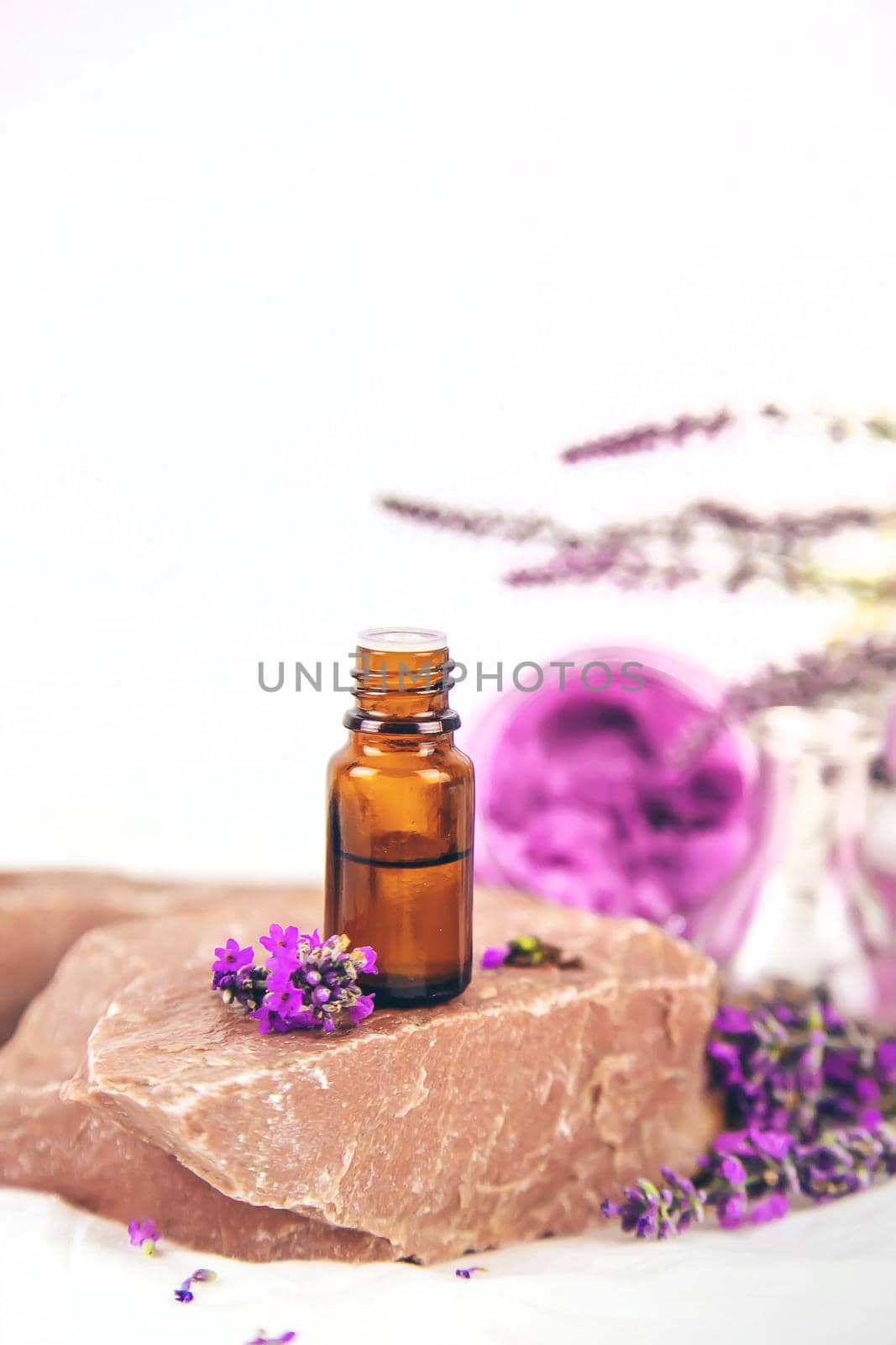 Essential oil with lavender extract. Selective focus. Nature.