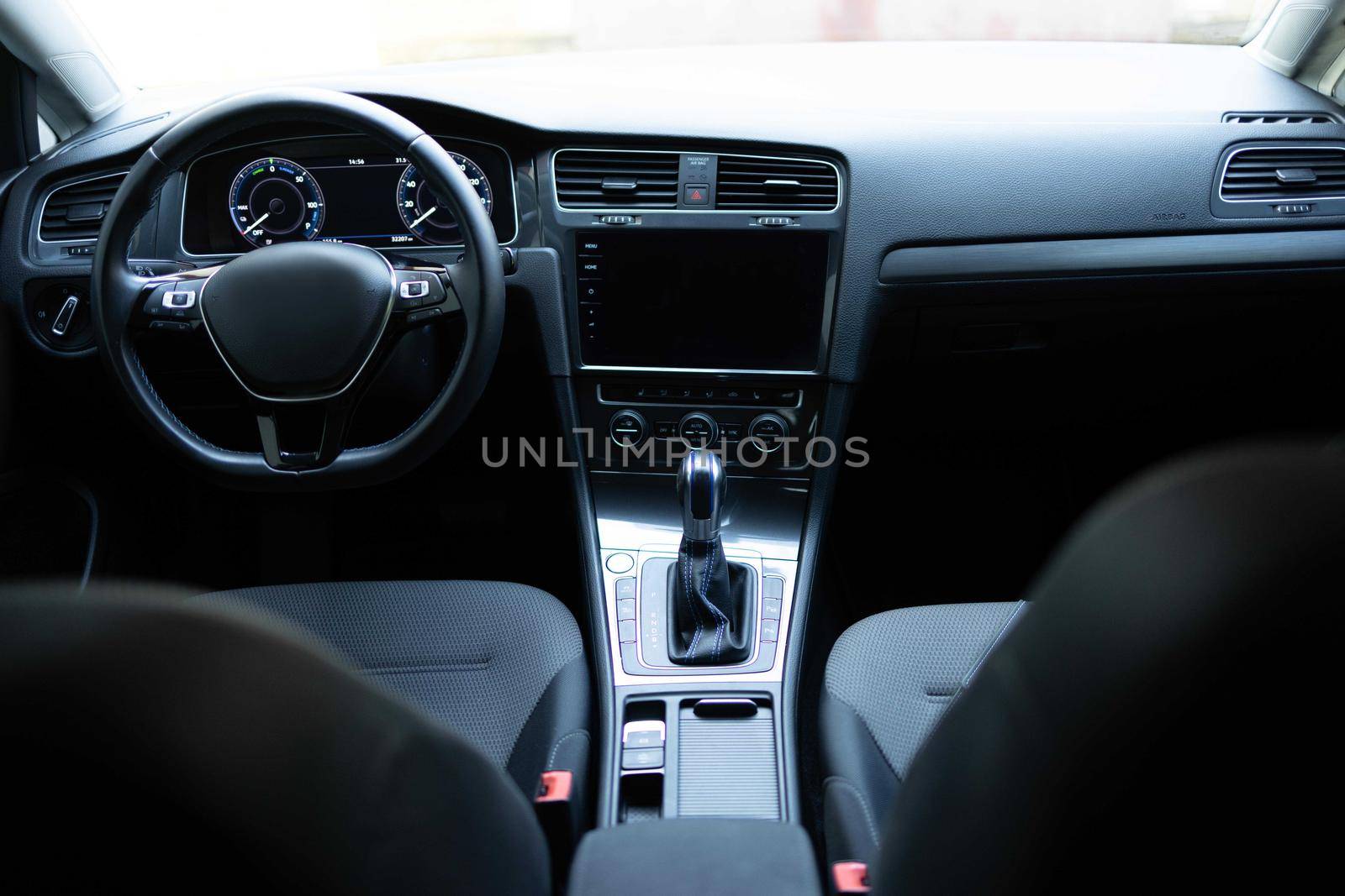 Electric car interior details adjustments. Inside car interior with front seats, driver and passenger, textile, windows, console, gear shift, electric buttons, digital speedometer by uflypro