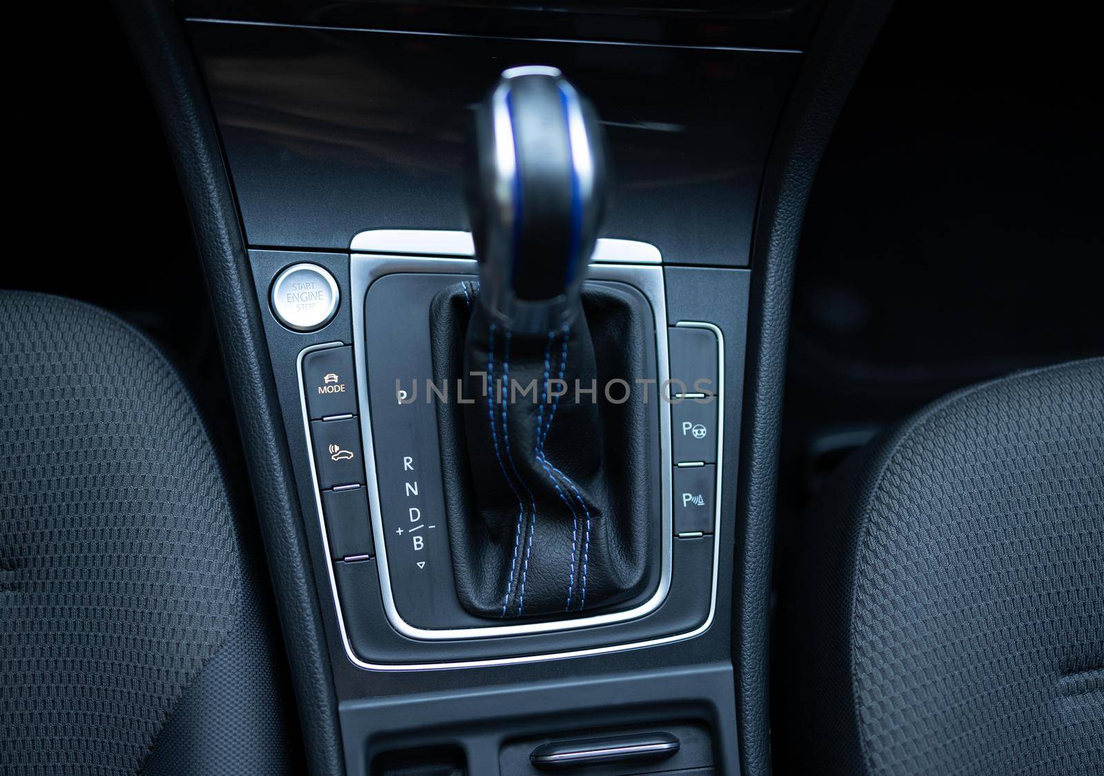 Handle of electric car gearbox control. Design details of minimalist concept of electric car - close-up details of automatic transmission and gear stick. Automatic gear lever and gear shift by uflypro