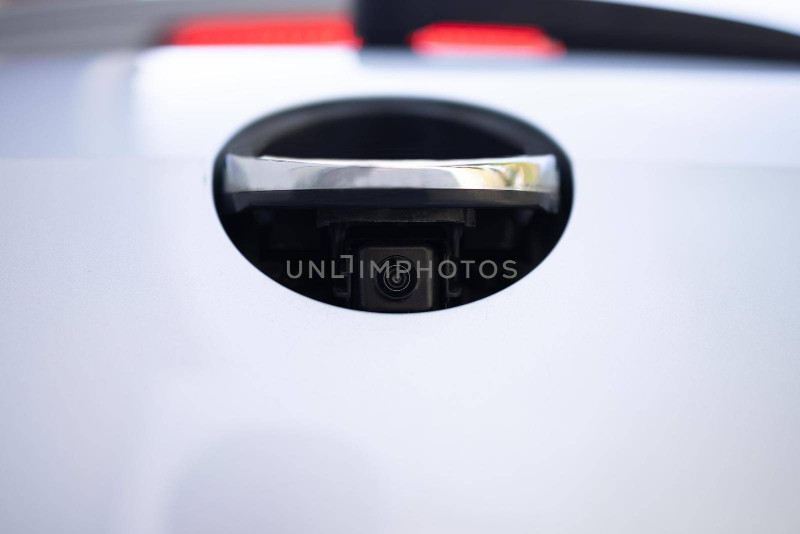 Rear view camera. Luxury back car rear view camera for parking assistance. Concept of safety car driving while parking process. Assist device equipment in modern electric cars. by uflypro