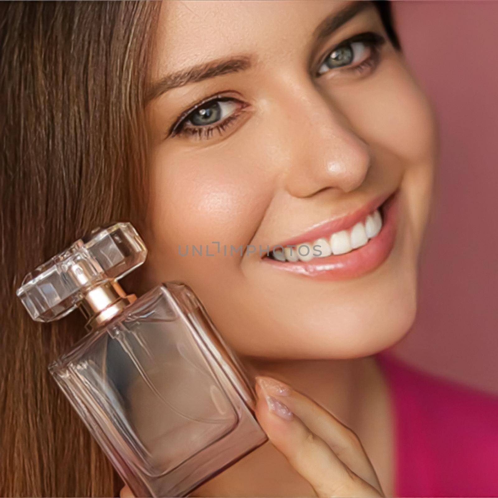 Perfume, beauty product and cosmetics model face portrait on pink background, beautiful woman holding fragrance bottle with floral feminine scent, fashion and makeup by Anneleven