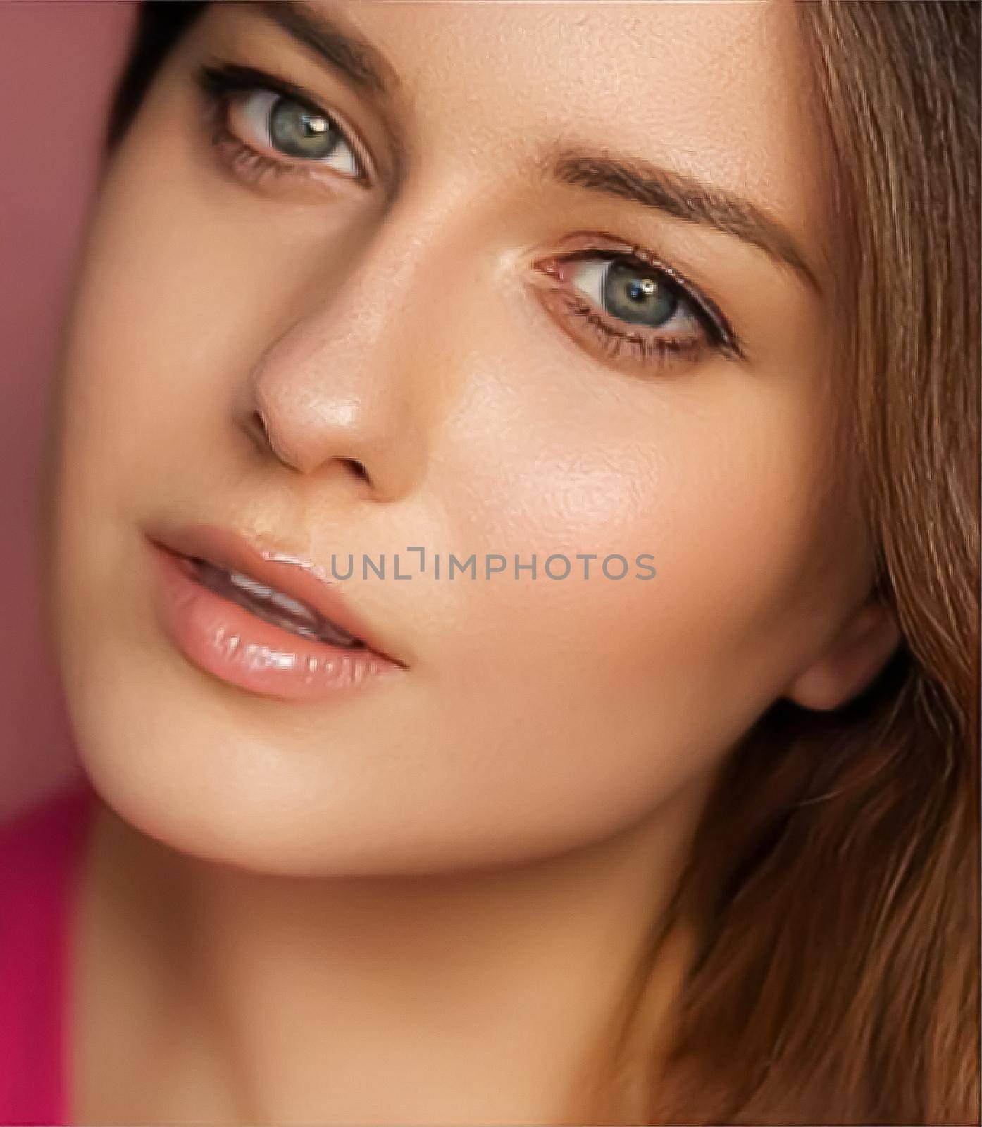 Beauty, makeup and skincare cosmetics model face portrait on pink background, beautiful woman with natural make-up, perfect healthy skin glow, facial care closeup