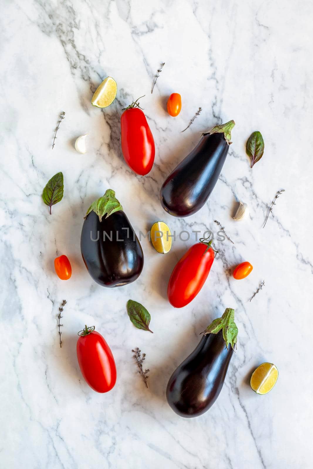 mediterranean cuisine vegetables on the marble background, top view