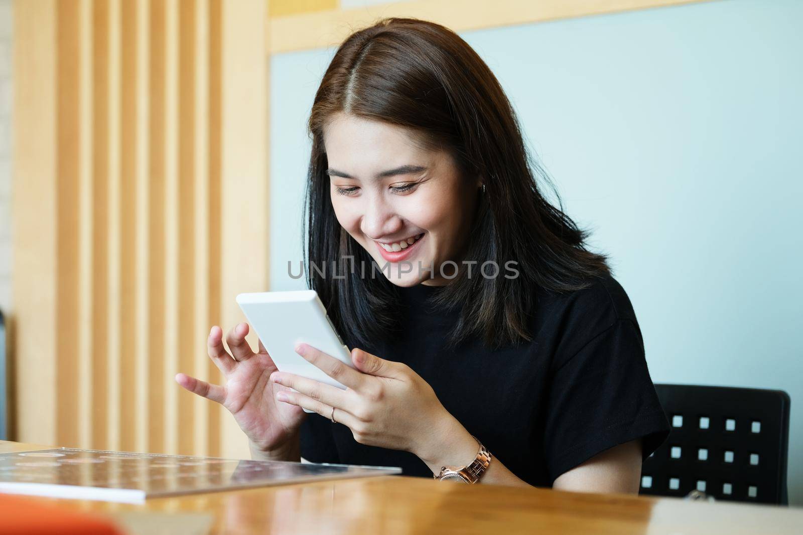 The young businesswoman is conference With people who work with use smartphone.