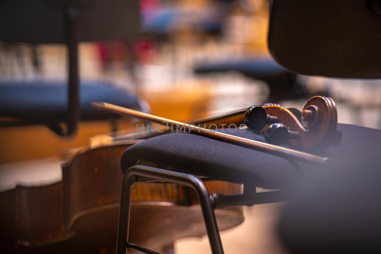 cello on the stage of the Philharmonic during a concert.