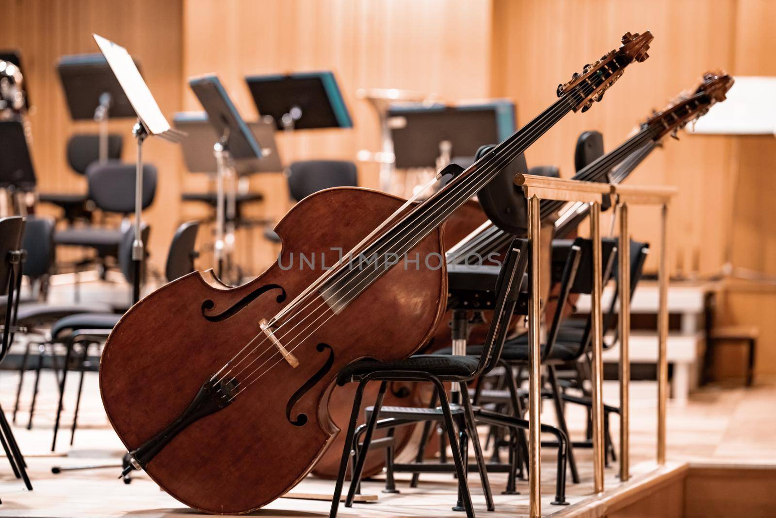 cello on the stage of the Philharmonic during a concert.