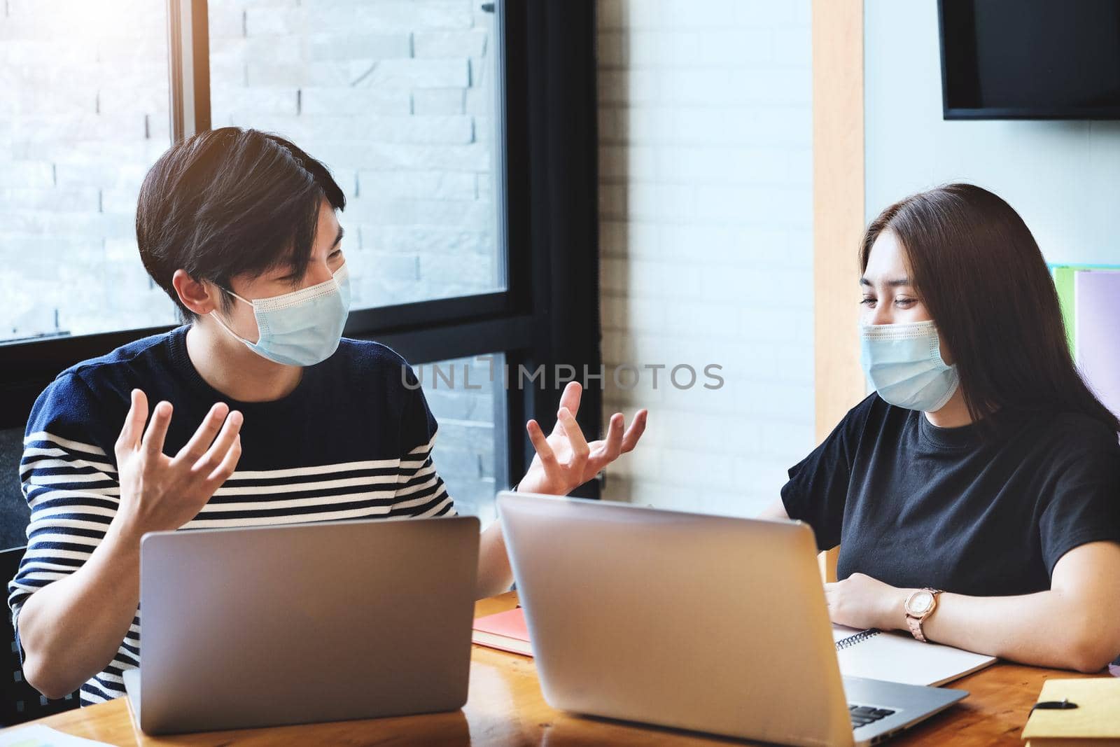 vintage tone effect with focus at businessman Discussion and exchange of ideas during work with business woman by Manastrong