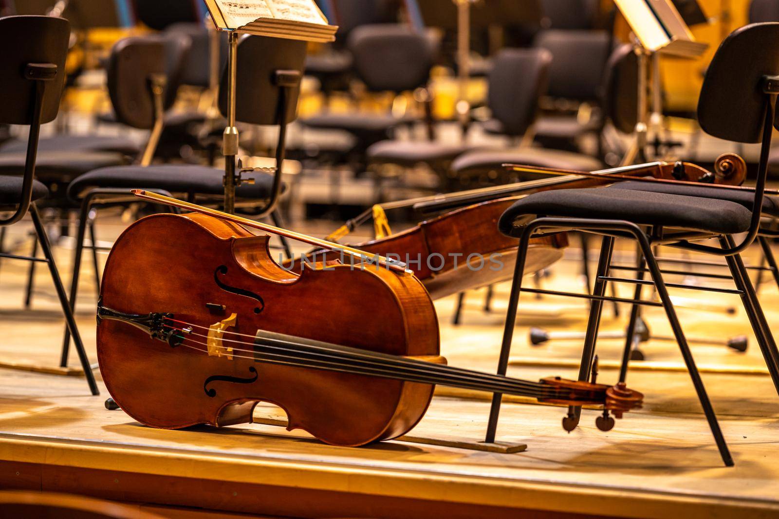 cello on the stage of the Philharmonic during a concert.