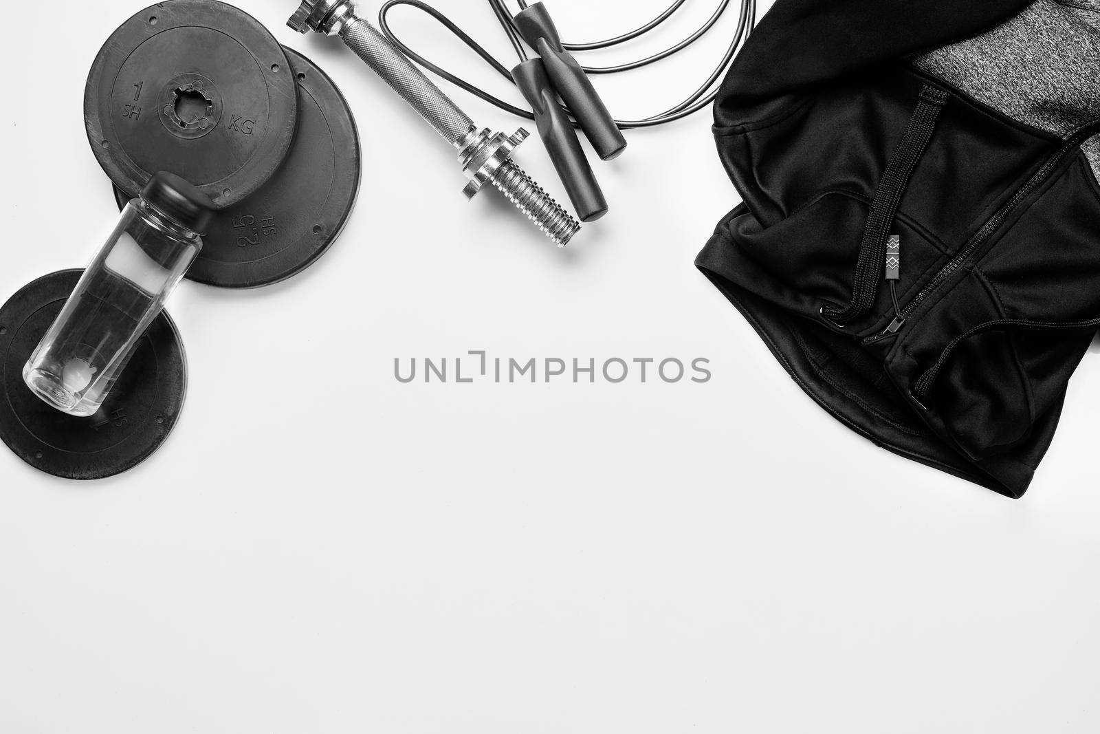 Top view of Sport stuff on white background. Fitness lifestyle concept. Free space for text. Flat lay. Copy space