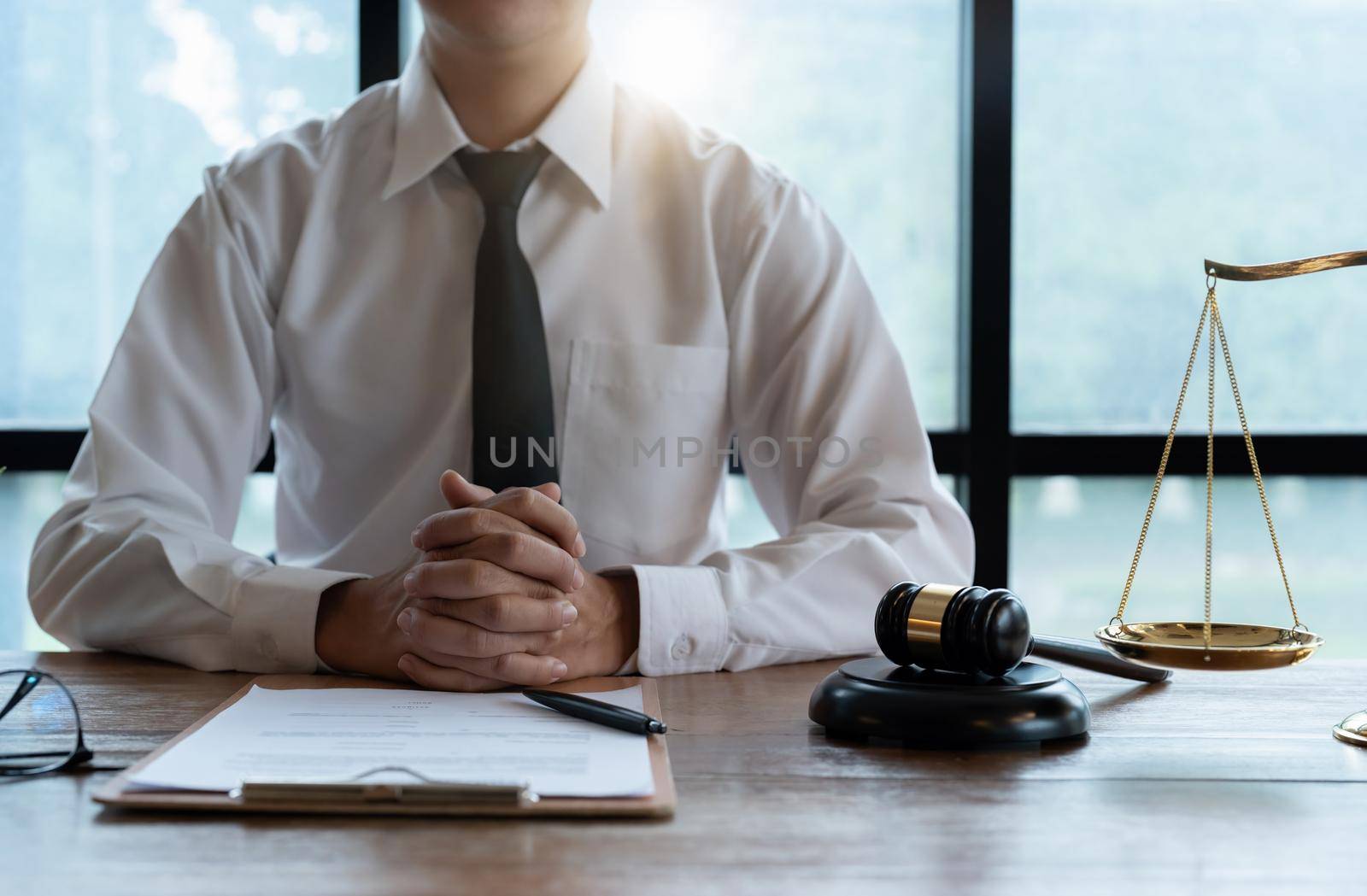 Close up business lawyer man reaching out sheet with contract agreement proposing to sign.Full and accurate details, individual who owns the business sign personally,director of the company, solicitor