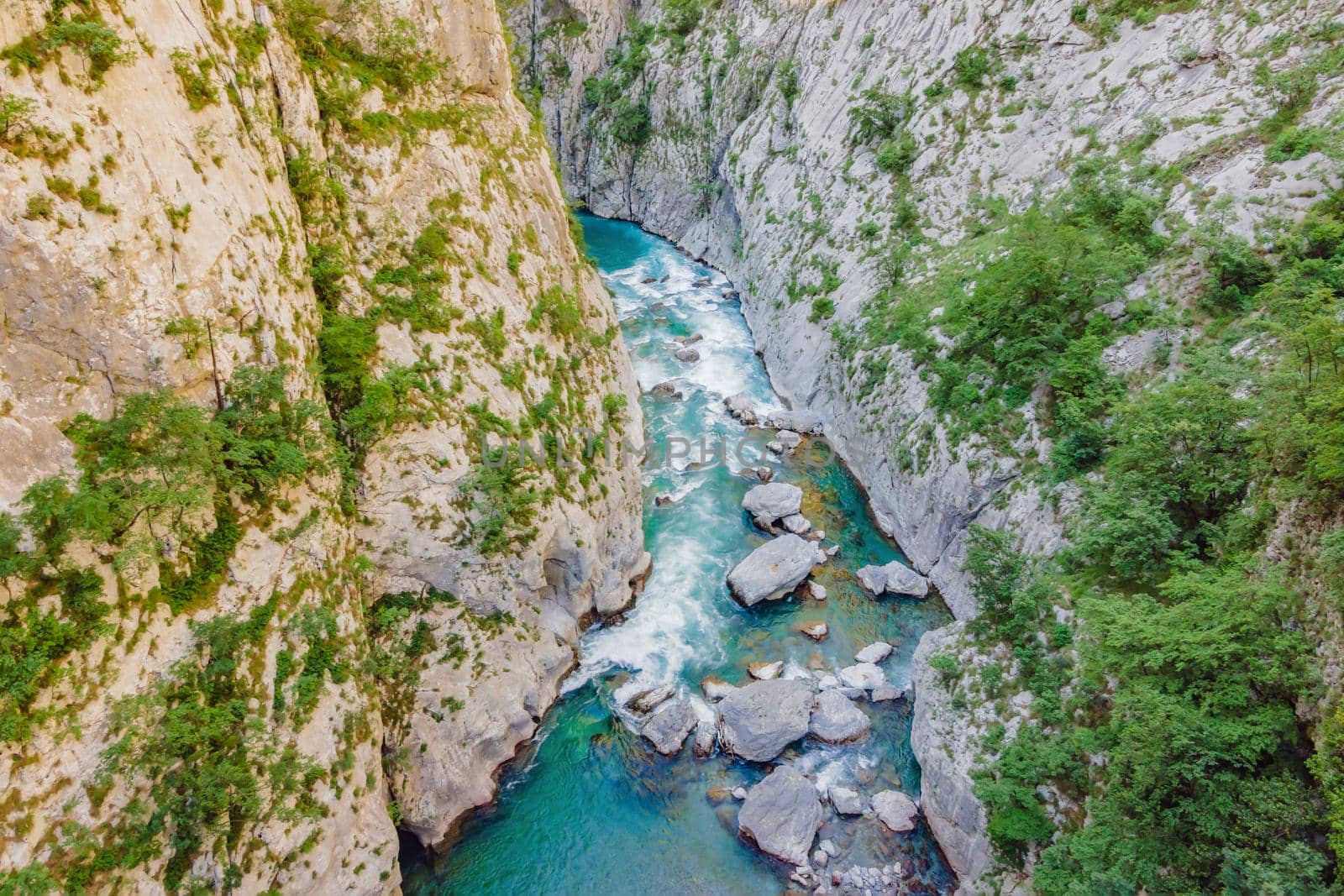 The purest waters of the turquoise color of the river Moraca flowing among the canyons. Travel around Montenegro concept.