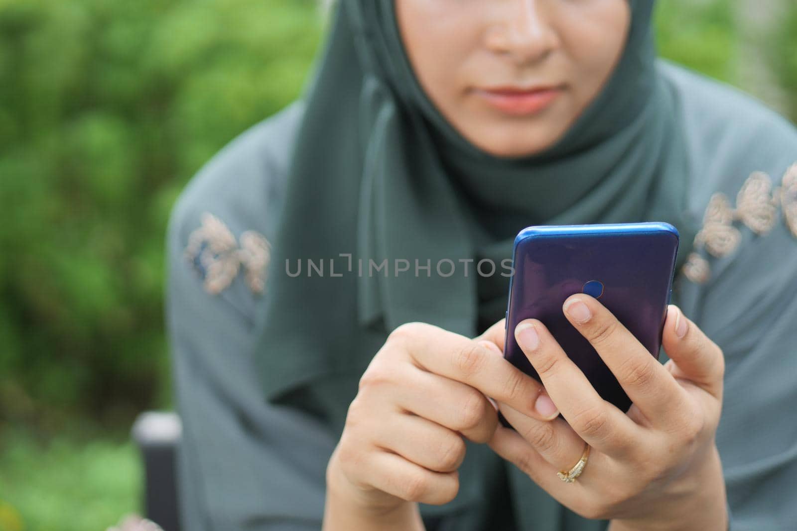 close up of women hand holding smart phone.