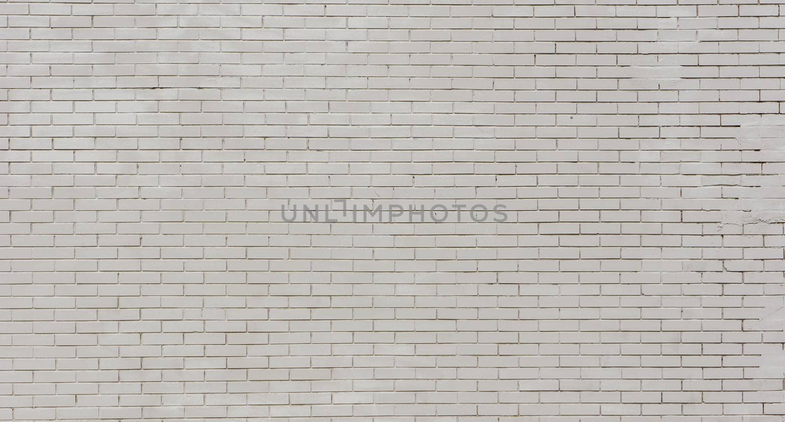 White painted old brick Wall panoramic background. by gelog67