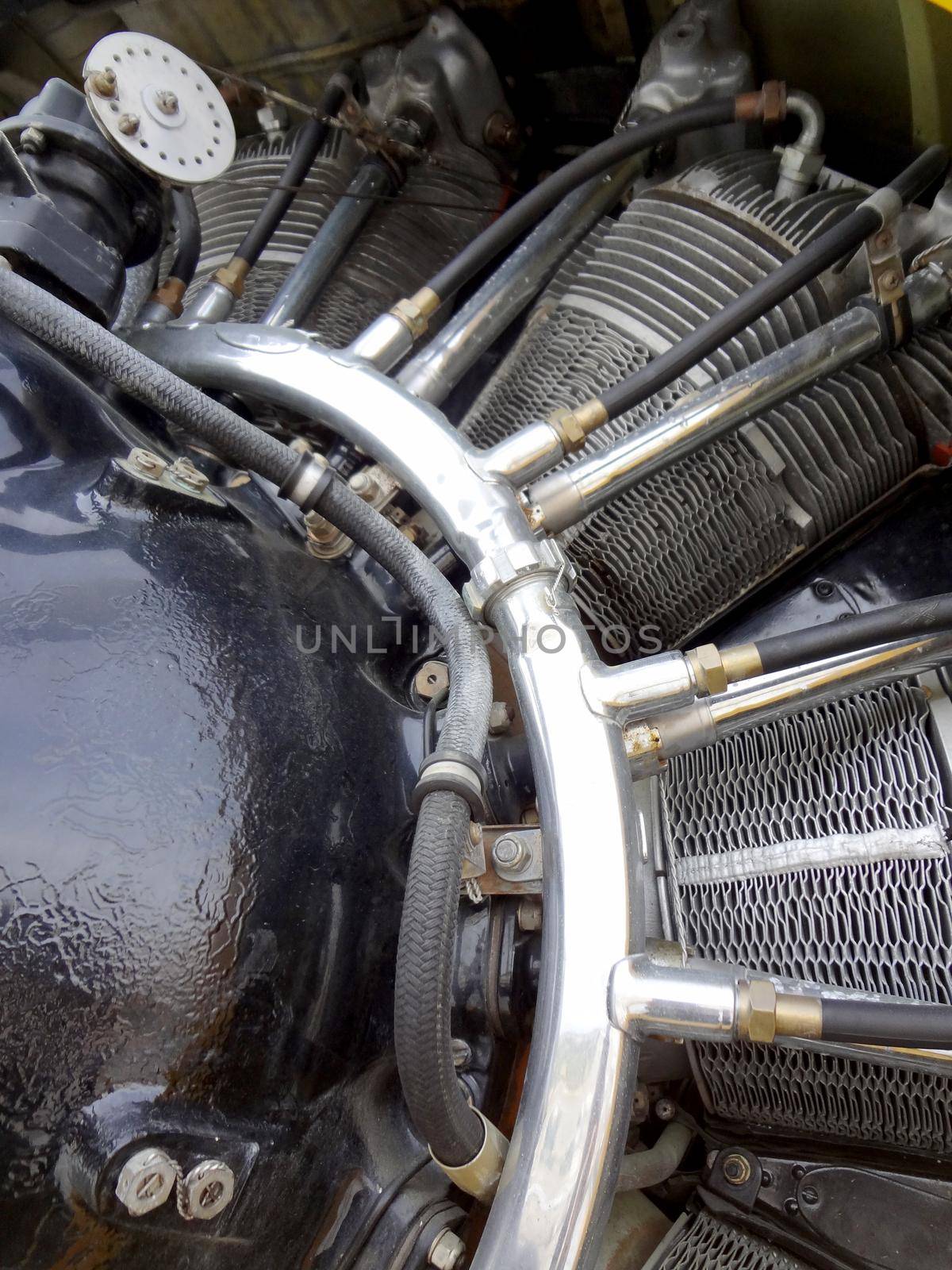 Close up of turbine of a propeller engine and powerful pistons with signs of wear.