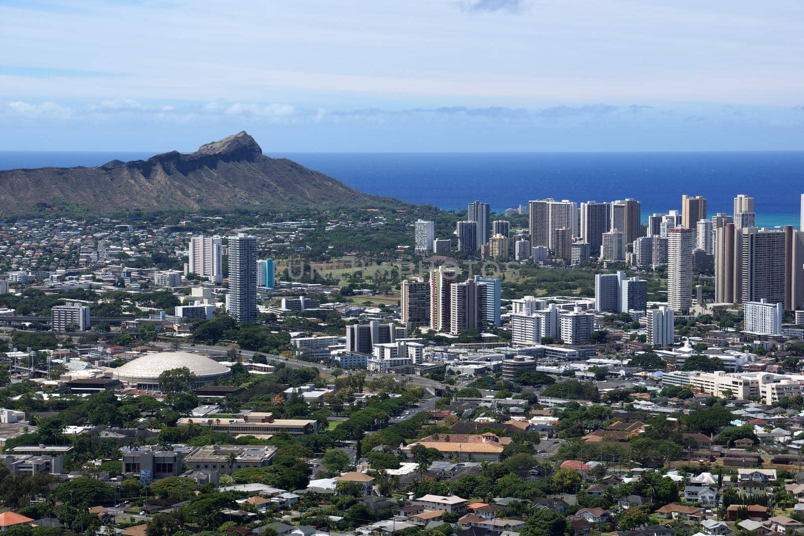 Corner of Diamondhead and the city of Honolulu on Oahu on a nice day. UH Manoa, Waikiki, Kahala and the H-1 Visible, seen from Round Top Dr. lookout point.
