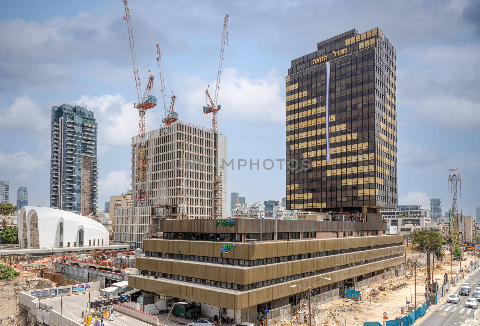 TEL AVIV, ISRAEL - MAY 01 2022: Somail complex in Tel Aviv. Construction work on the new Tel Aviv Municipality building. Urban Renewals, District 4, Century Tower, Migdal HaMeah. High quality photo