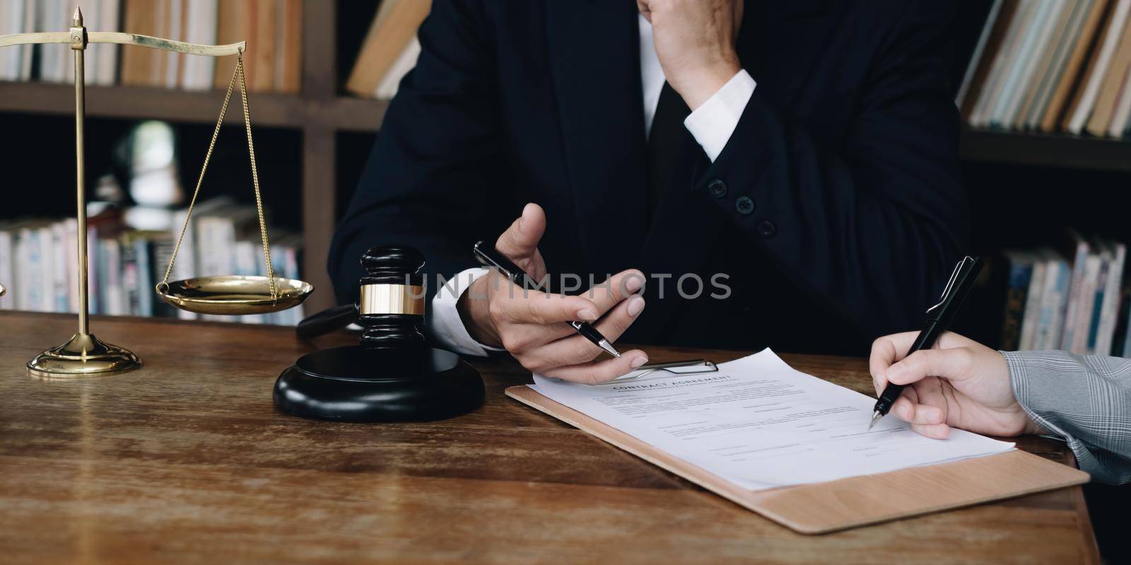 Group of business people and lawyers discussing contract papers ,Consultation between a male lawyer and businessman concept.