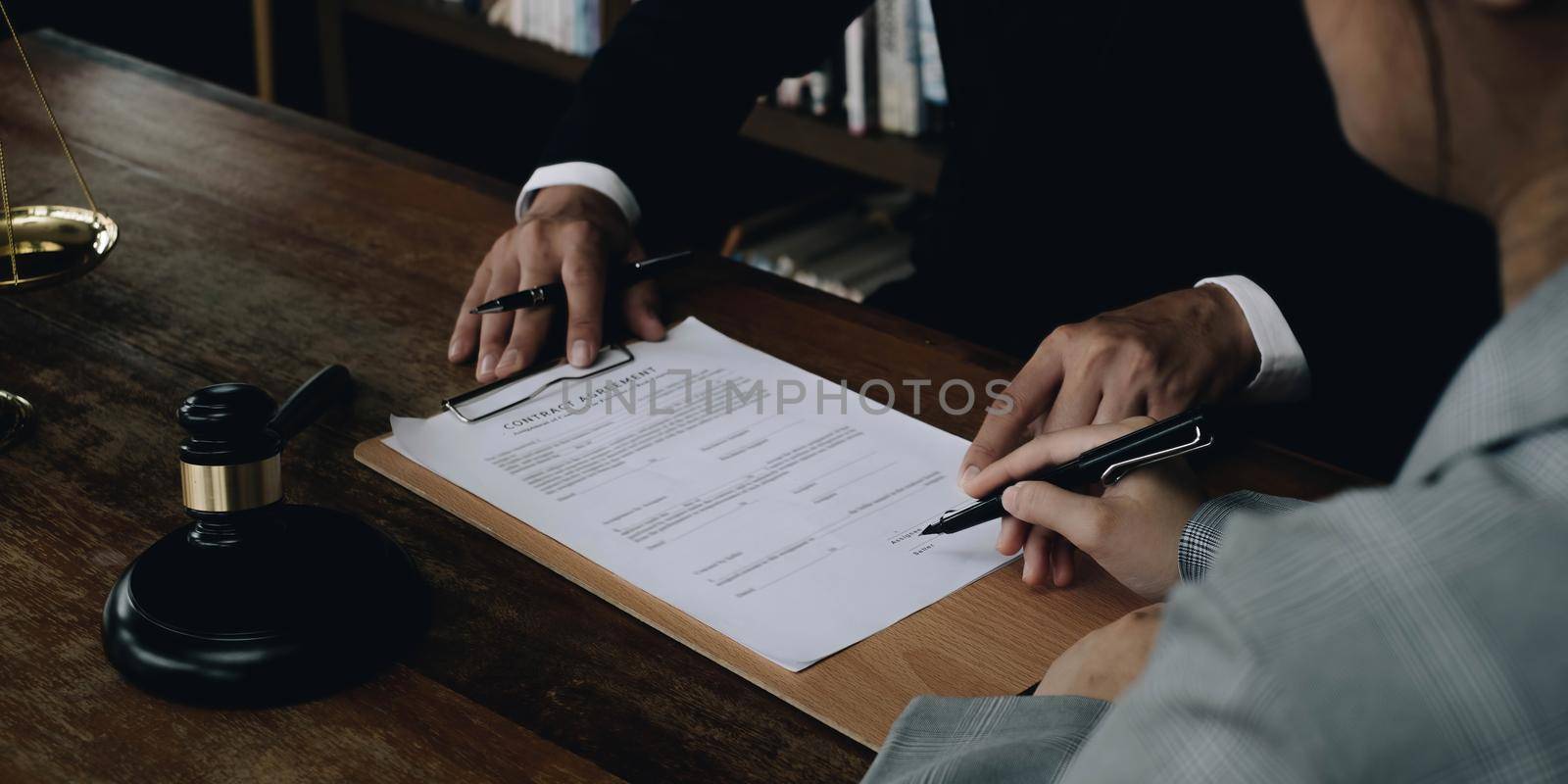 Group of business people and lawyers discussing contract papers ,Consultation between a male lawyer and businessman concept.