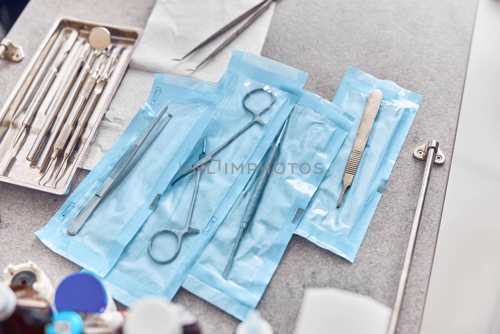 Dental professional equipment on a table of modern clinic by Yaroslav_astakhov