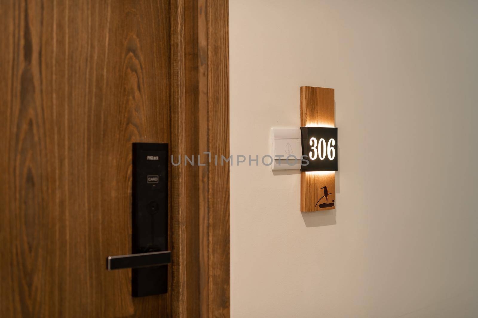 Hotel room number mounted on a wall