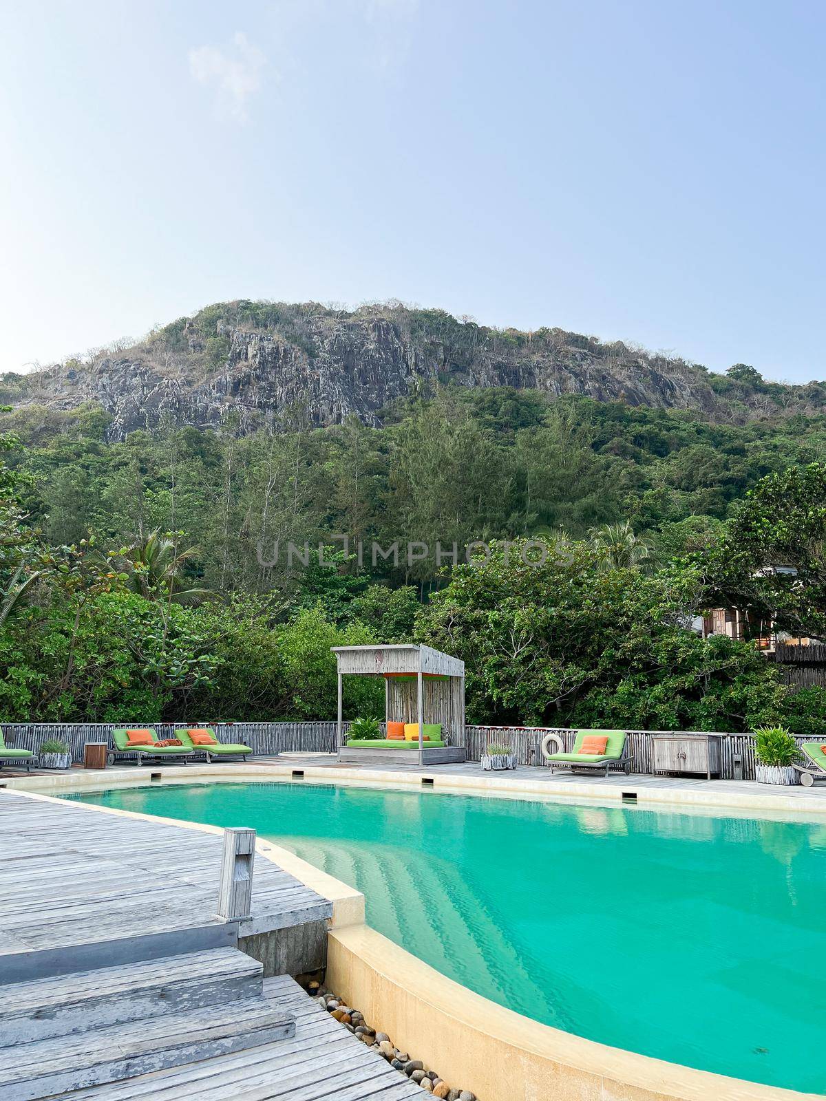 Swimming pool on roof top with beautiful mountain view. by makidotvn