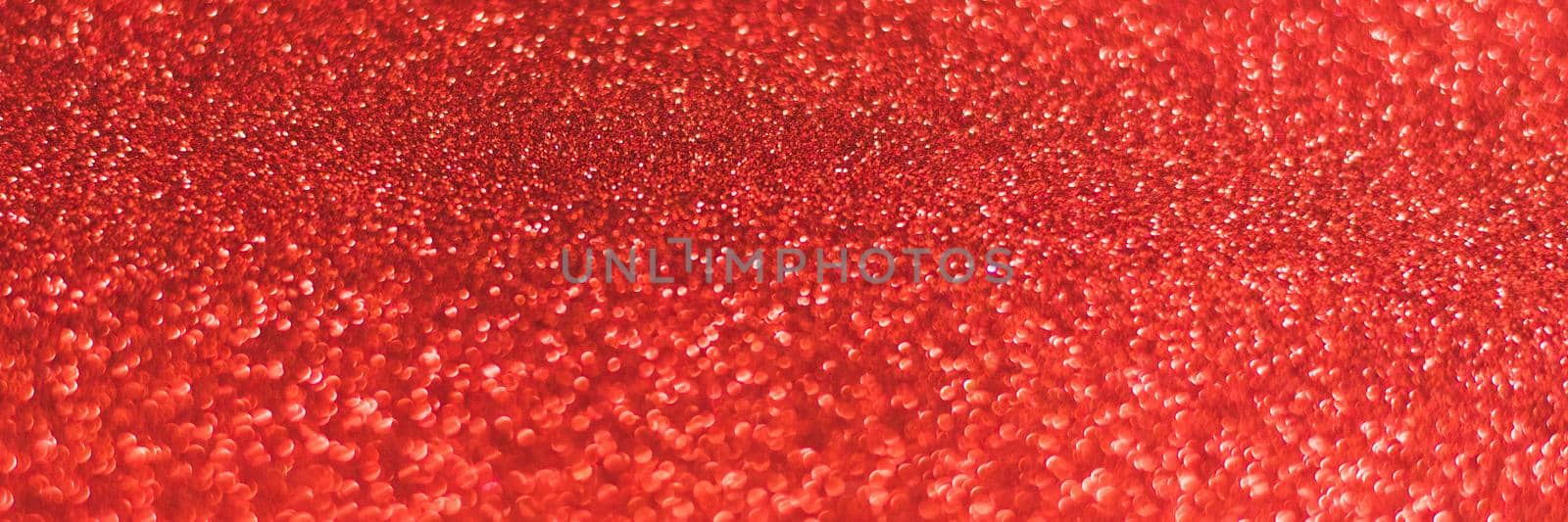 Red shiny background with sparkles. Abstract holiday background. Web banner.