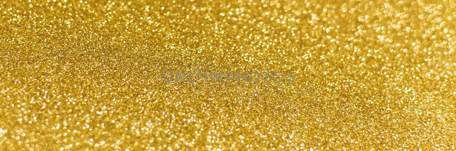 Golden shiny background. gold glitter texture christmas abstract background. Web banner by etonastenka