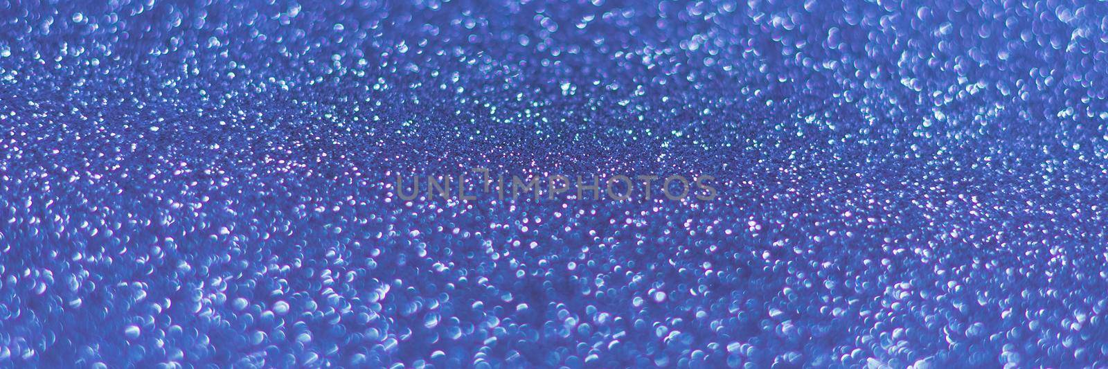 Blue shiny background with sparkles. Abstract holiday background. Web banner.