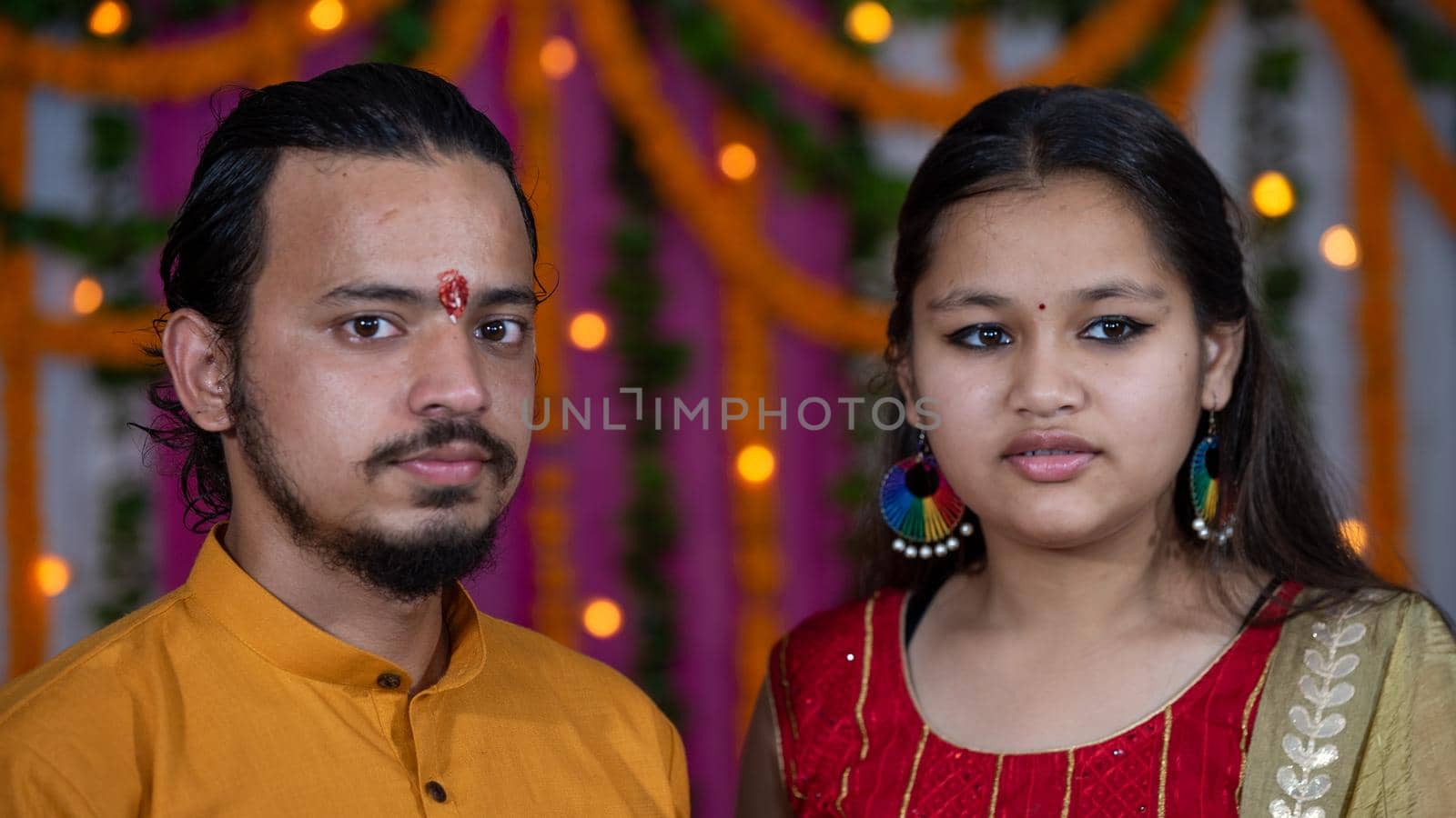 Indian children wearing ethnic Indian dress during Raksha Bandhan, a festival to celebrate the bond between brother-sister. Decoration in Indian houses.