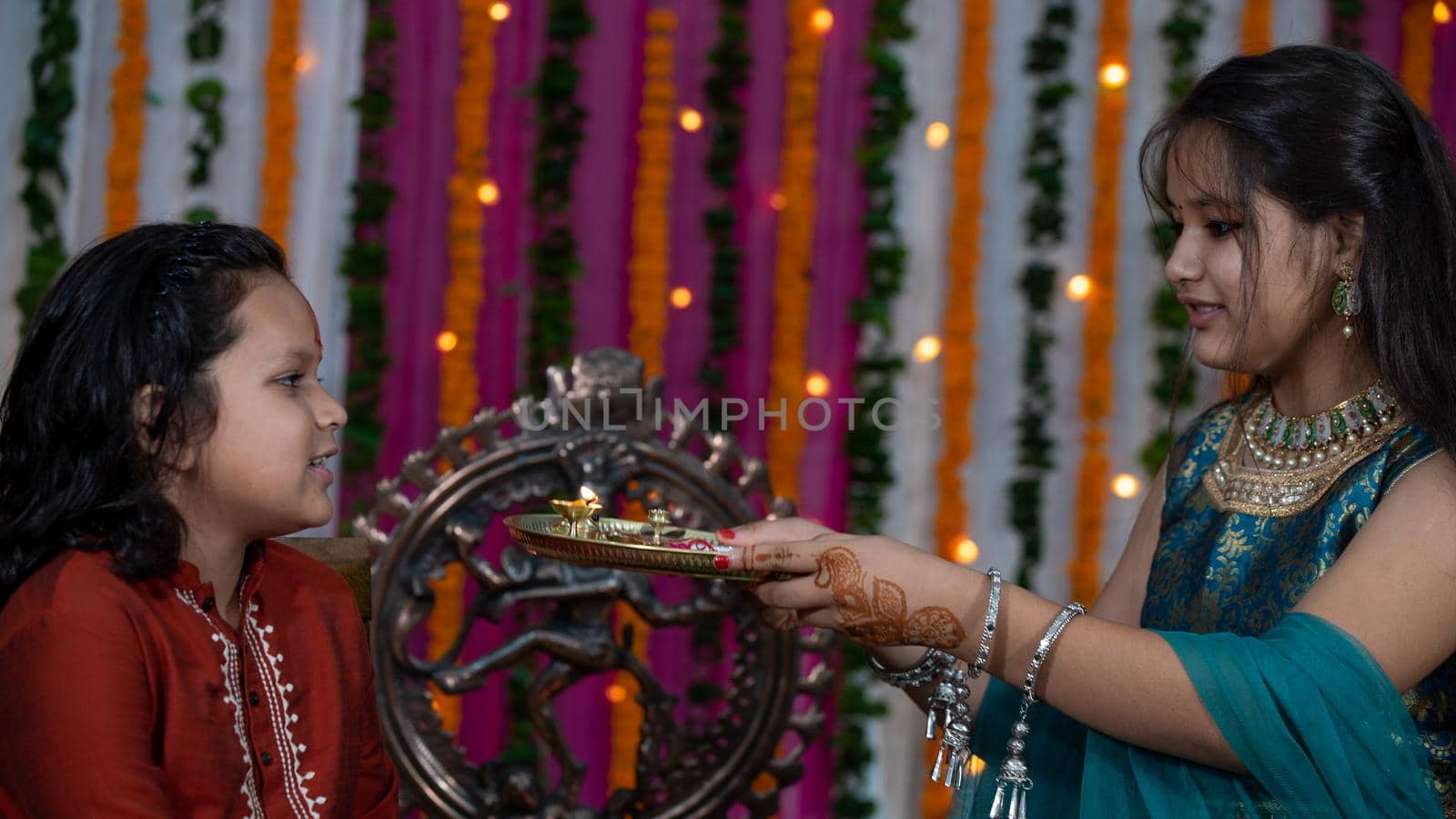 Indian family celebrating Raksha Bandhan festival. by stocksvids