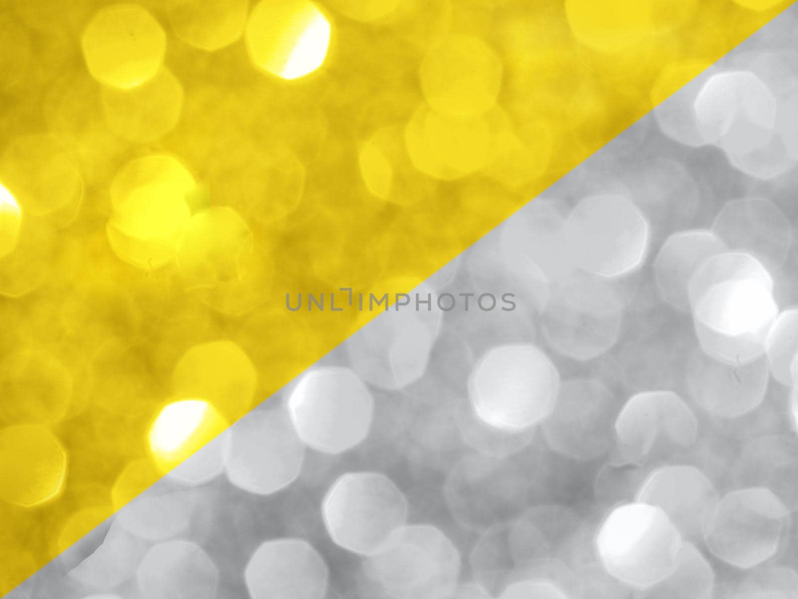 Trendy color of year 2021. Sparkling background made of yellow and gray colors. Color of year 2021 blurred backdrop for holidays and parties. Copy space